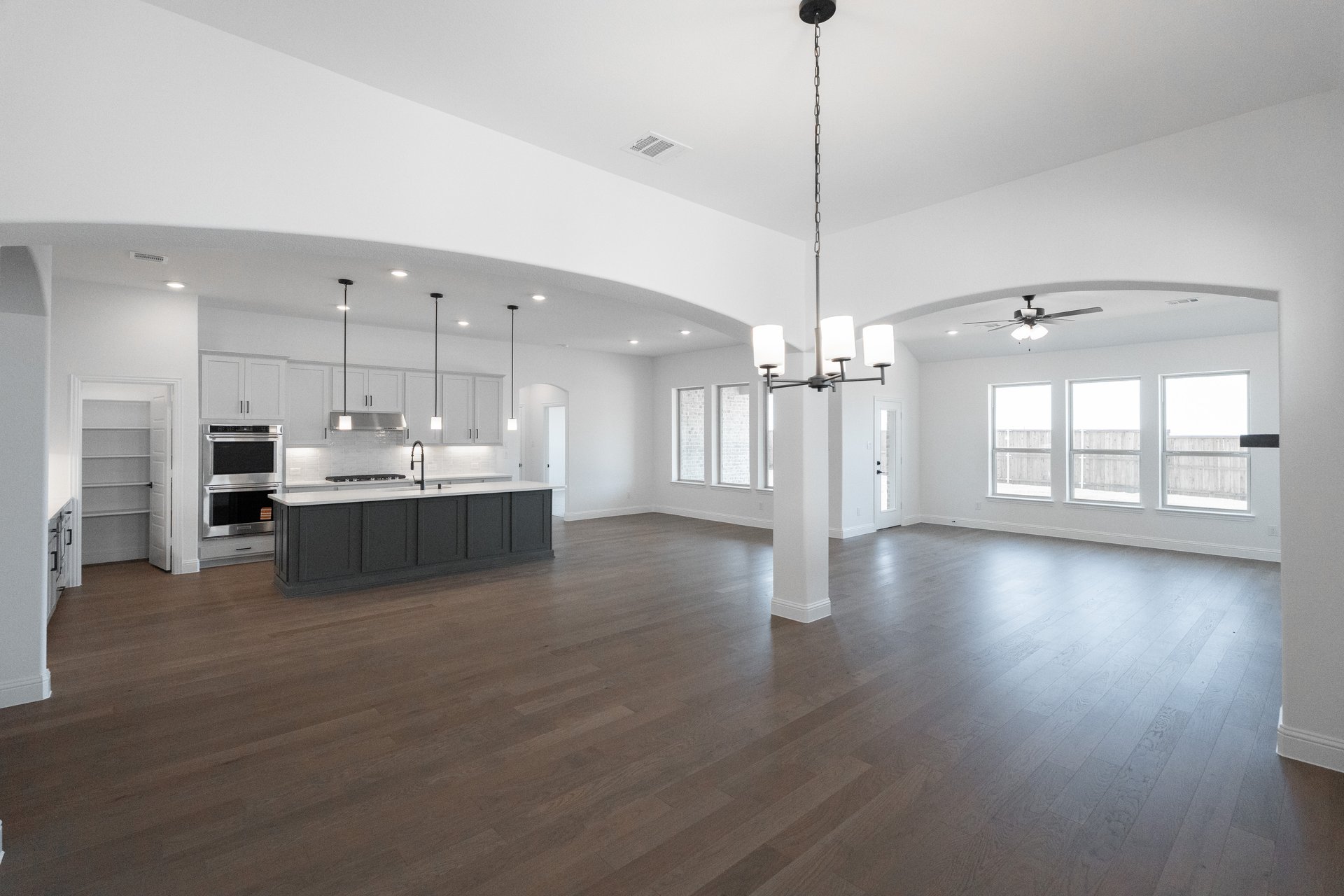 open dining room with hardwood flooring