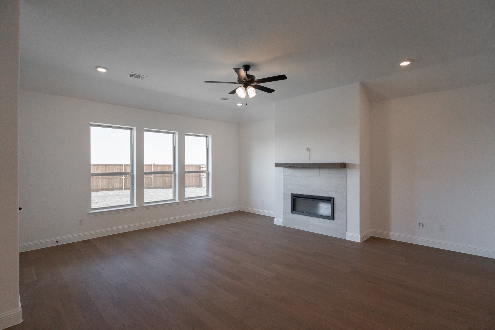 open great room with hardwood flooring