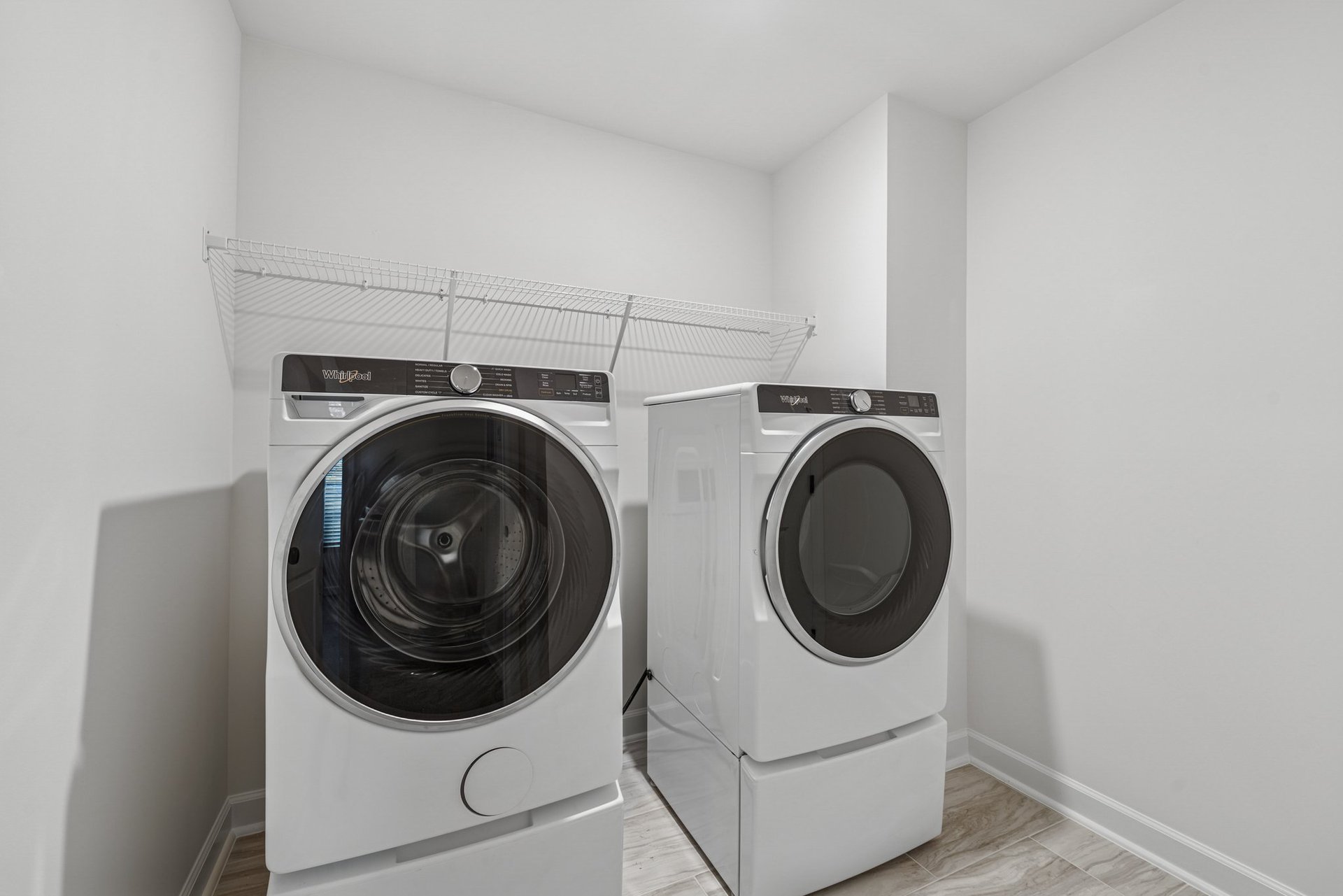 laundry room with washer and dryer