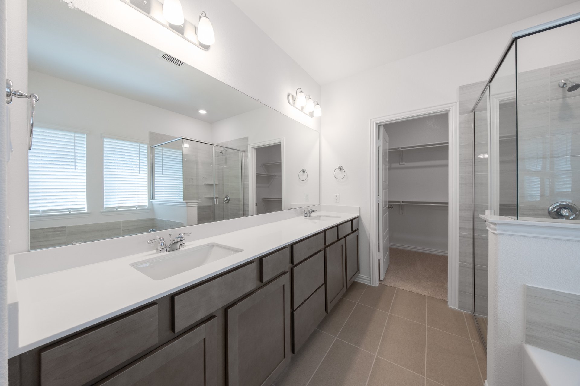 large primary bedroom with double sinks