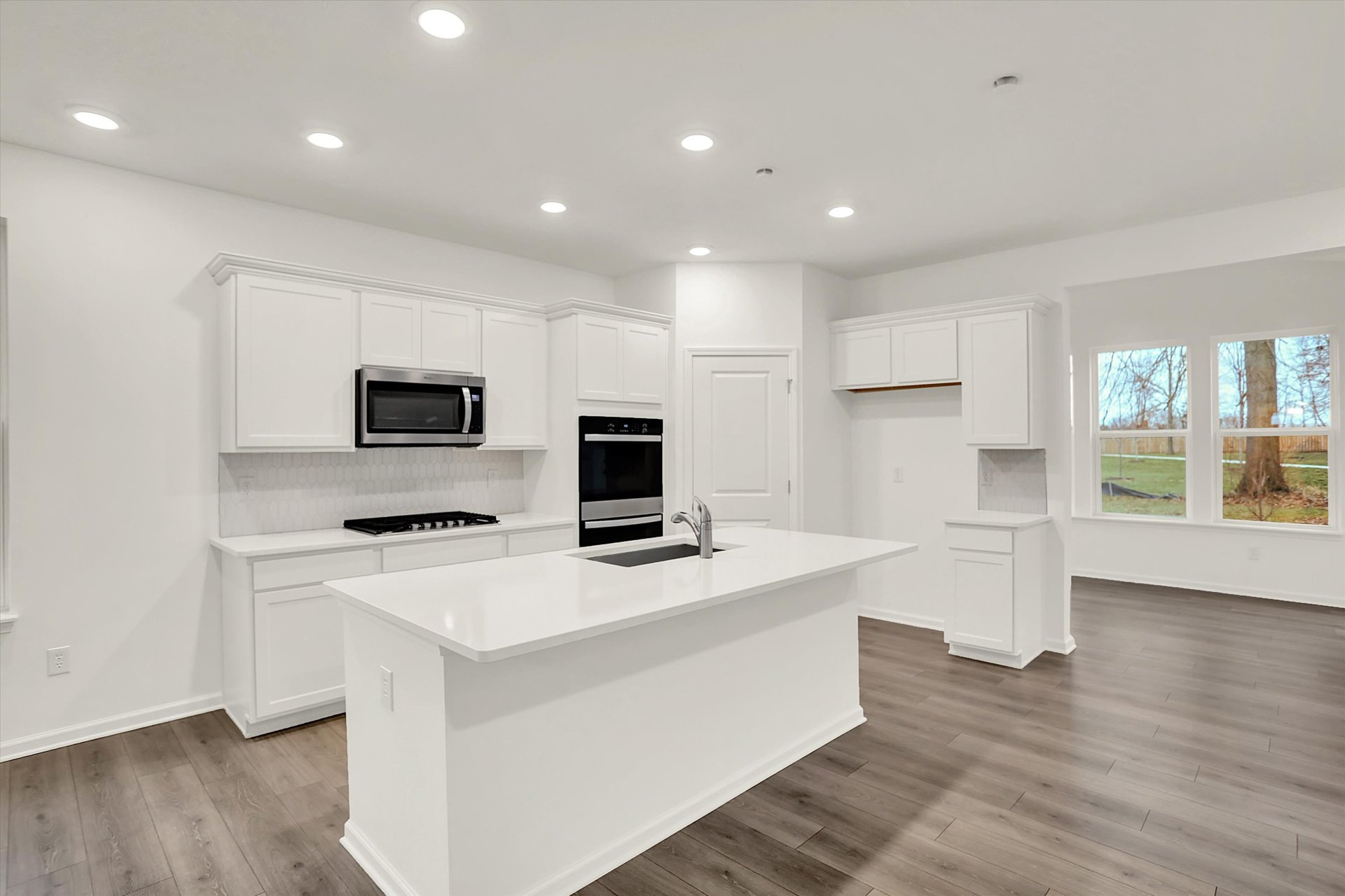 kitchen with large island and a double oven