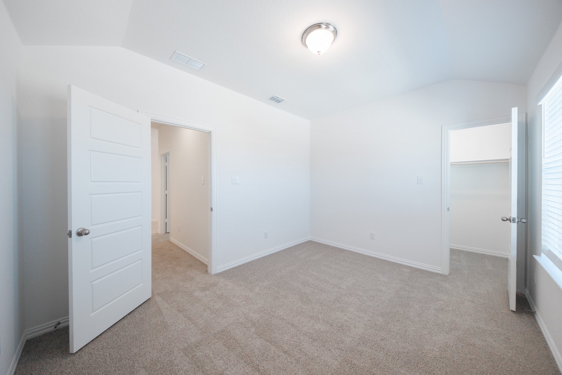 guest bedroom with carpet