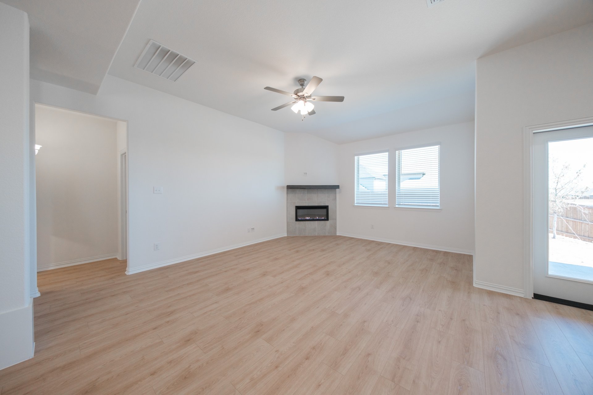 open great room with hardwood flooring