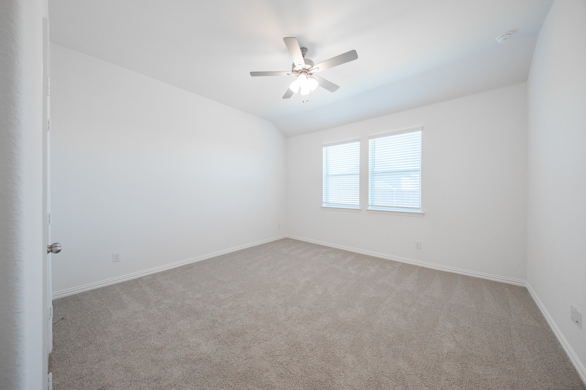 primary bedroom with carpet