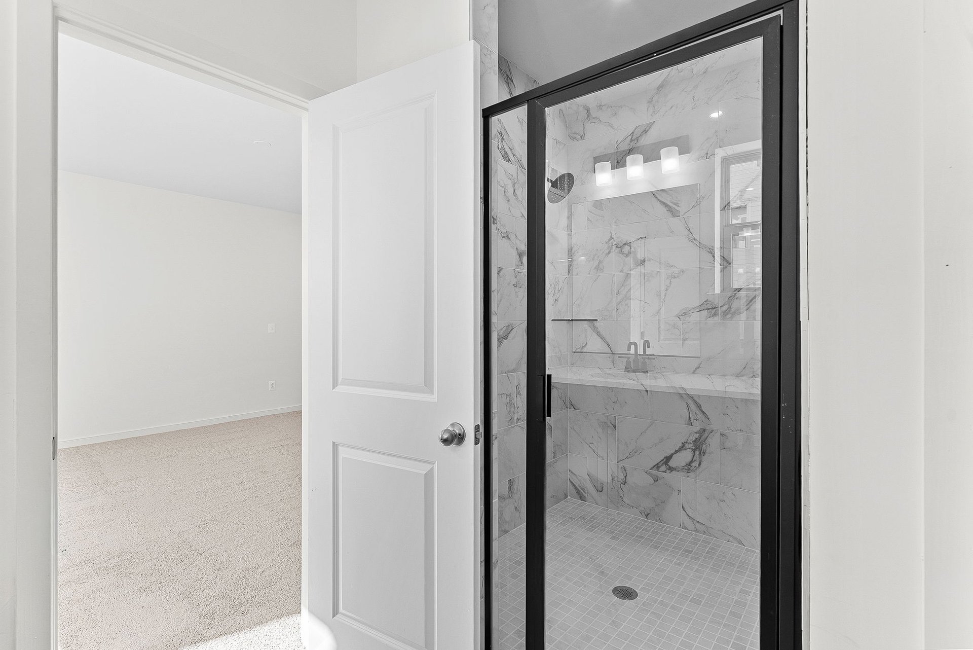 primary bathroom with an oversized shower