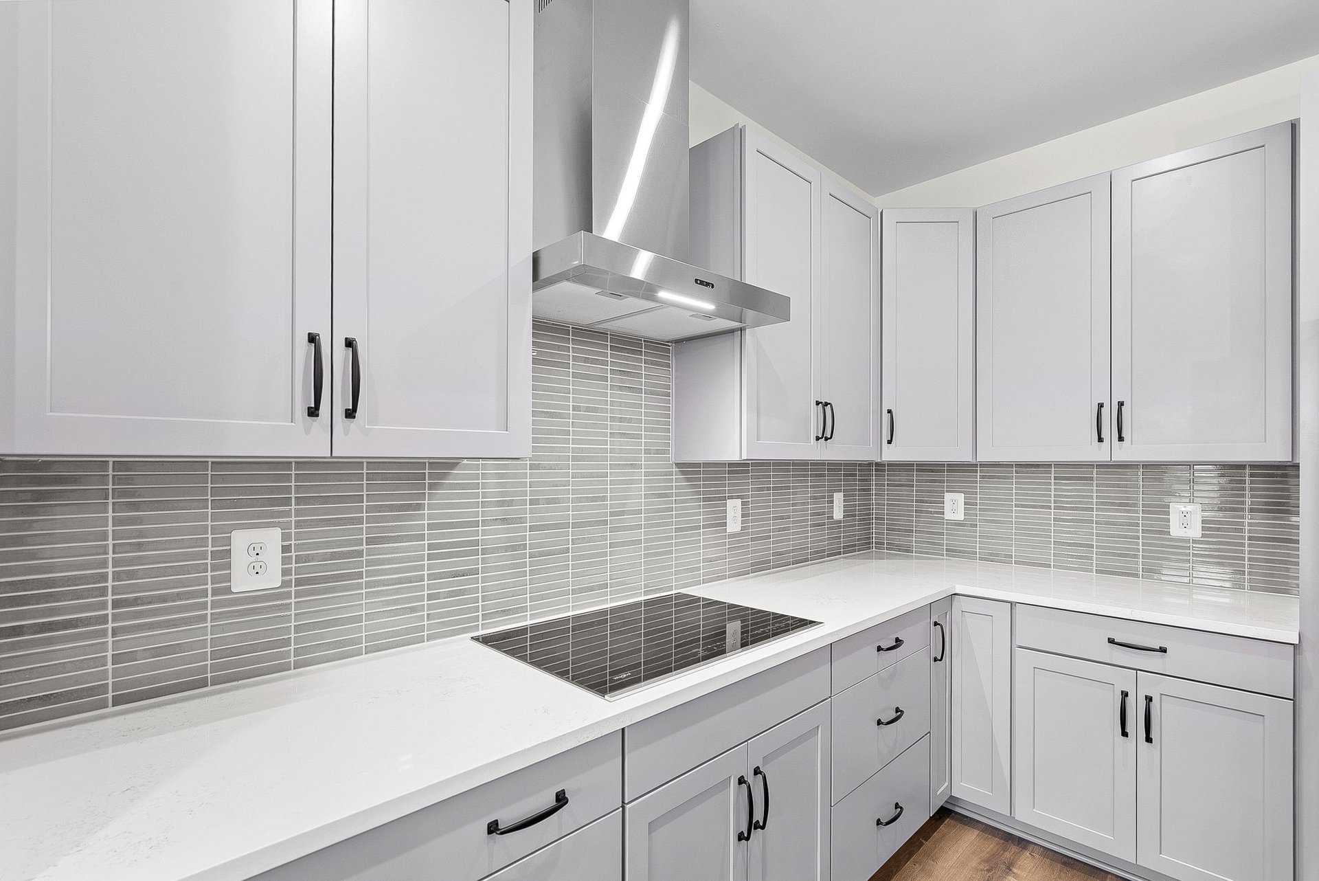 kitchen with white countertops and gray cabinets