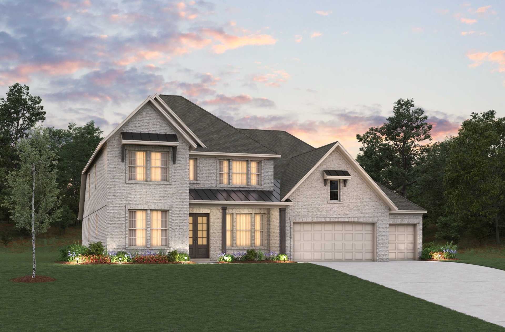 home exterior with 3-car garage and brick