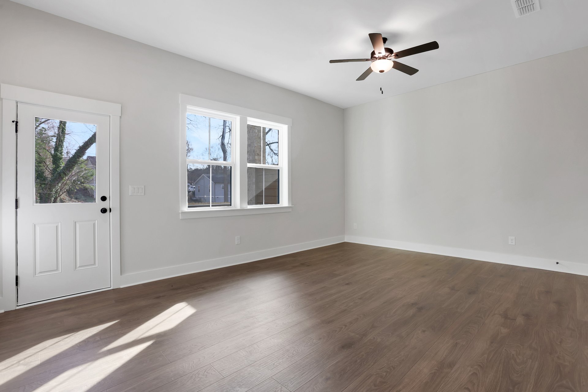 rec room with hard surface flooring and door to backyard