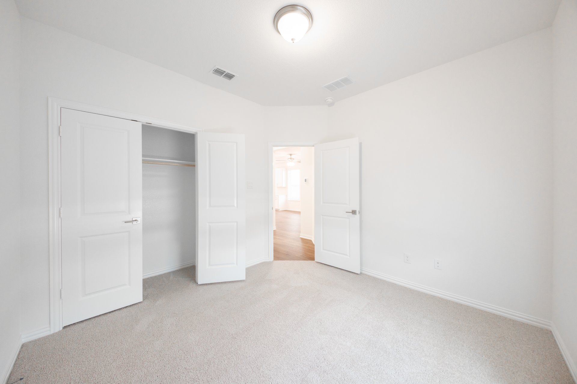 guest bedroom with carpet