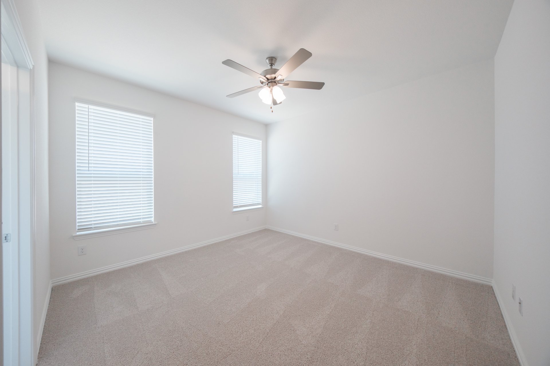primary bedroom with carpet