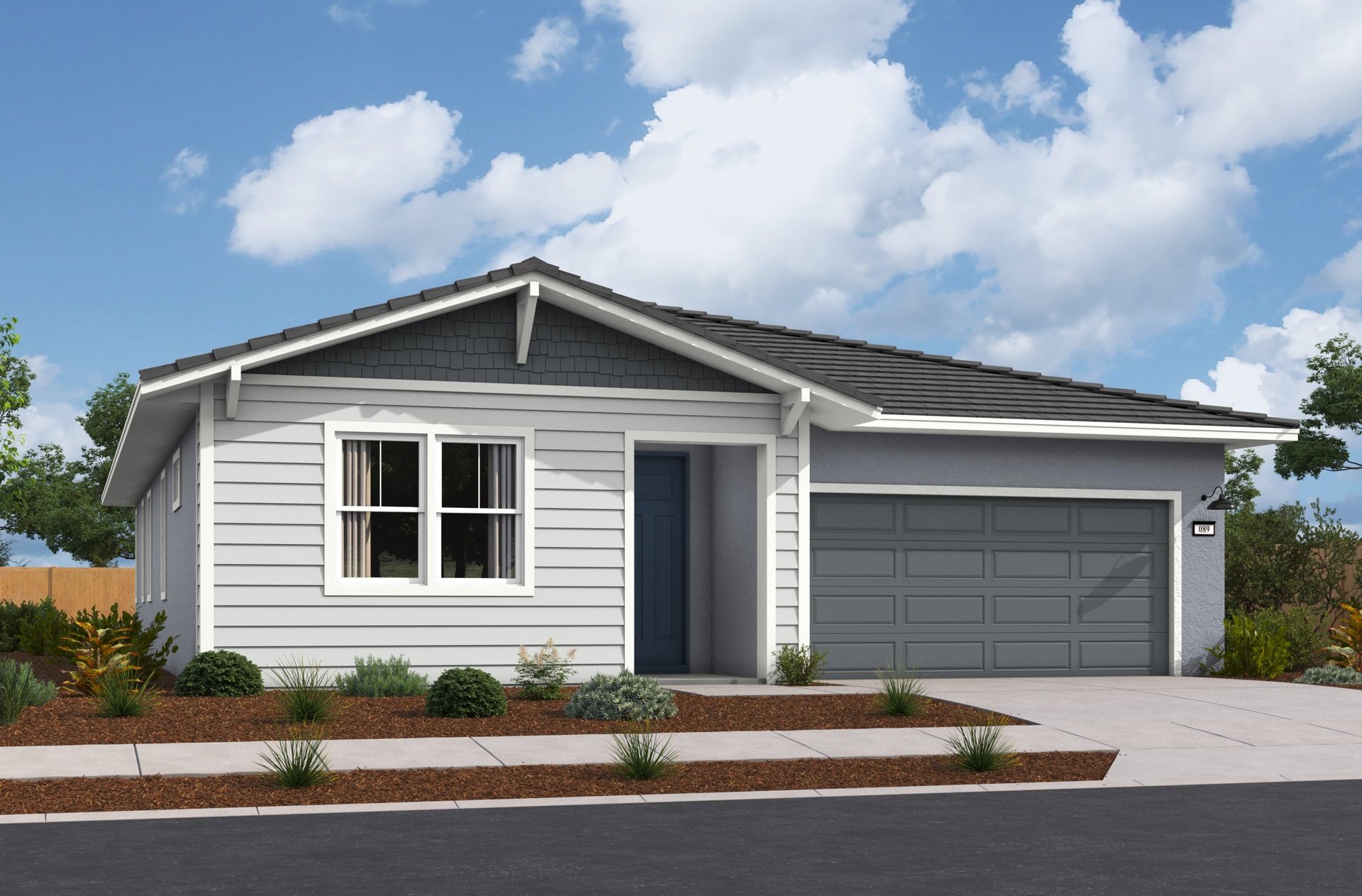 front exterior of single-story gray and white home with blue front door