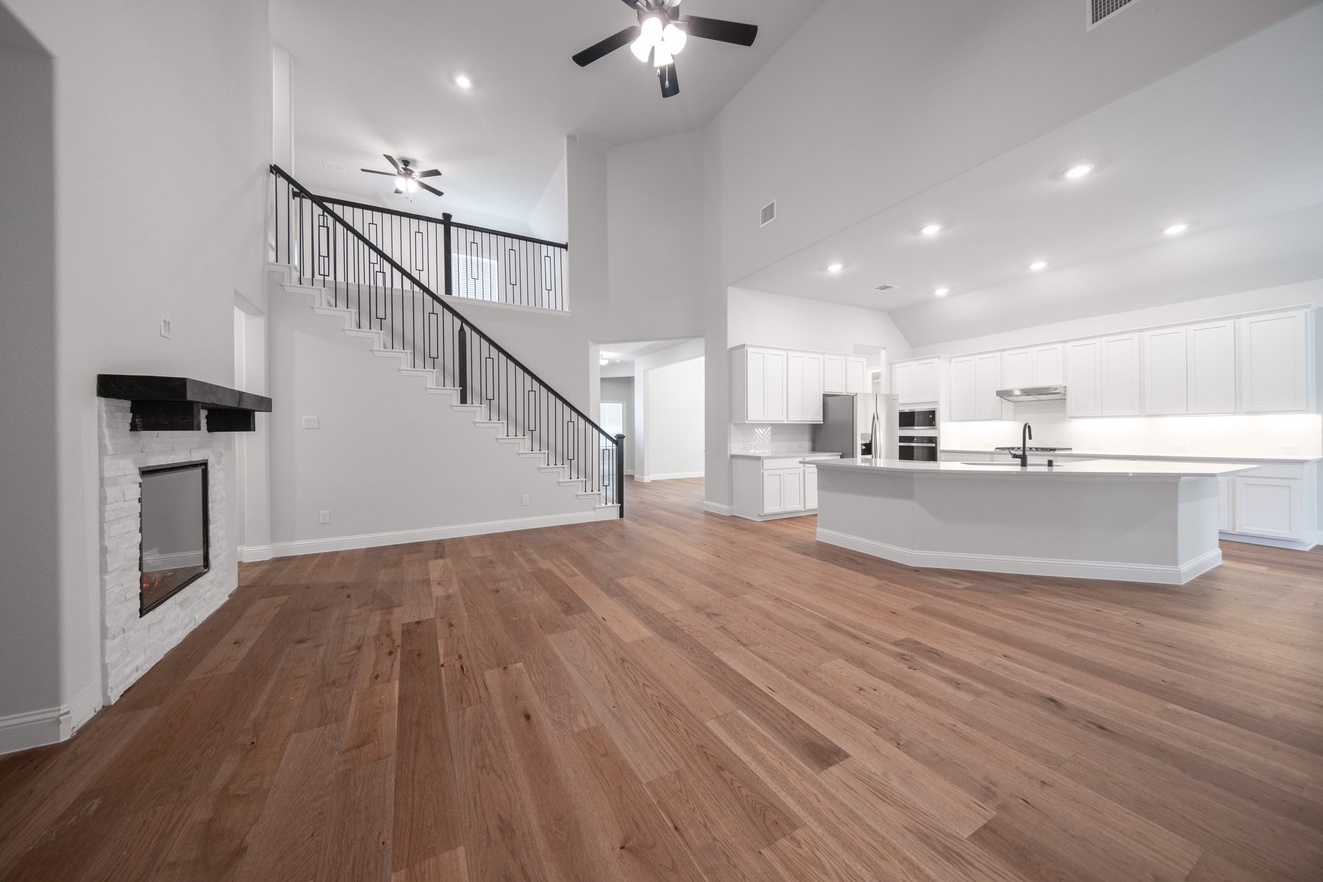 spacious great room with two-story ceilings