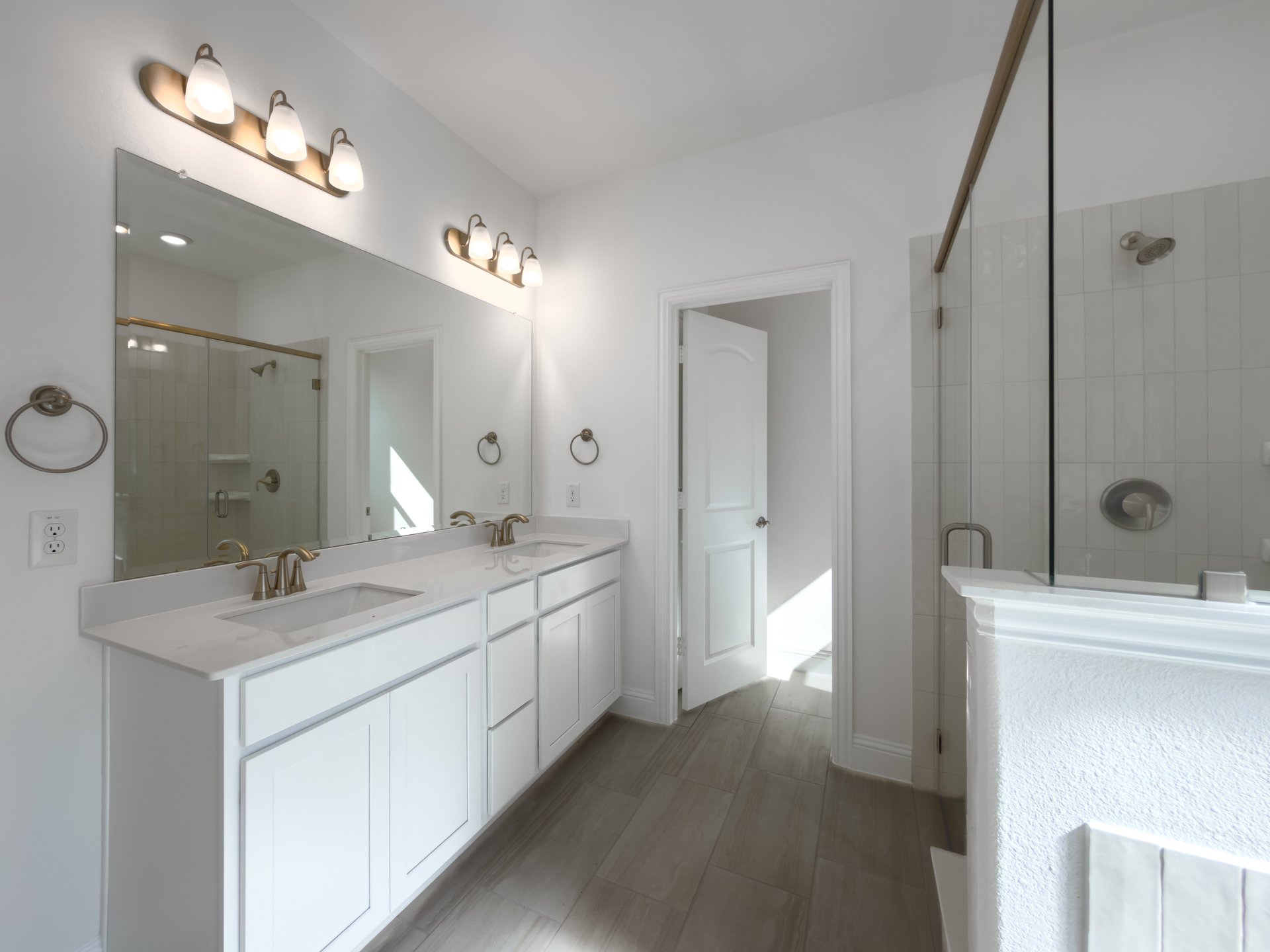 primary bathroom with separate soaking tub and shower
