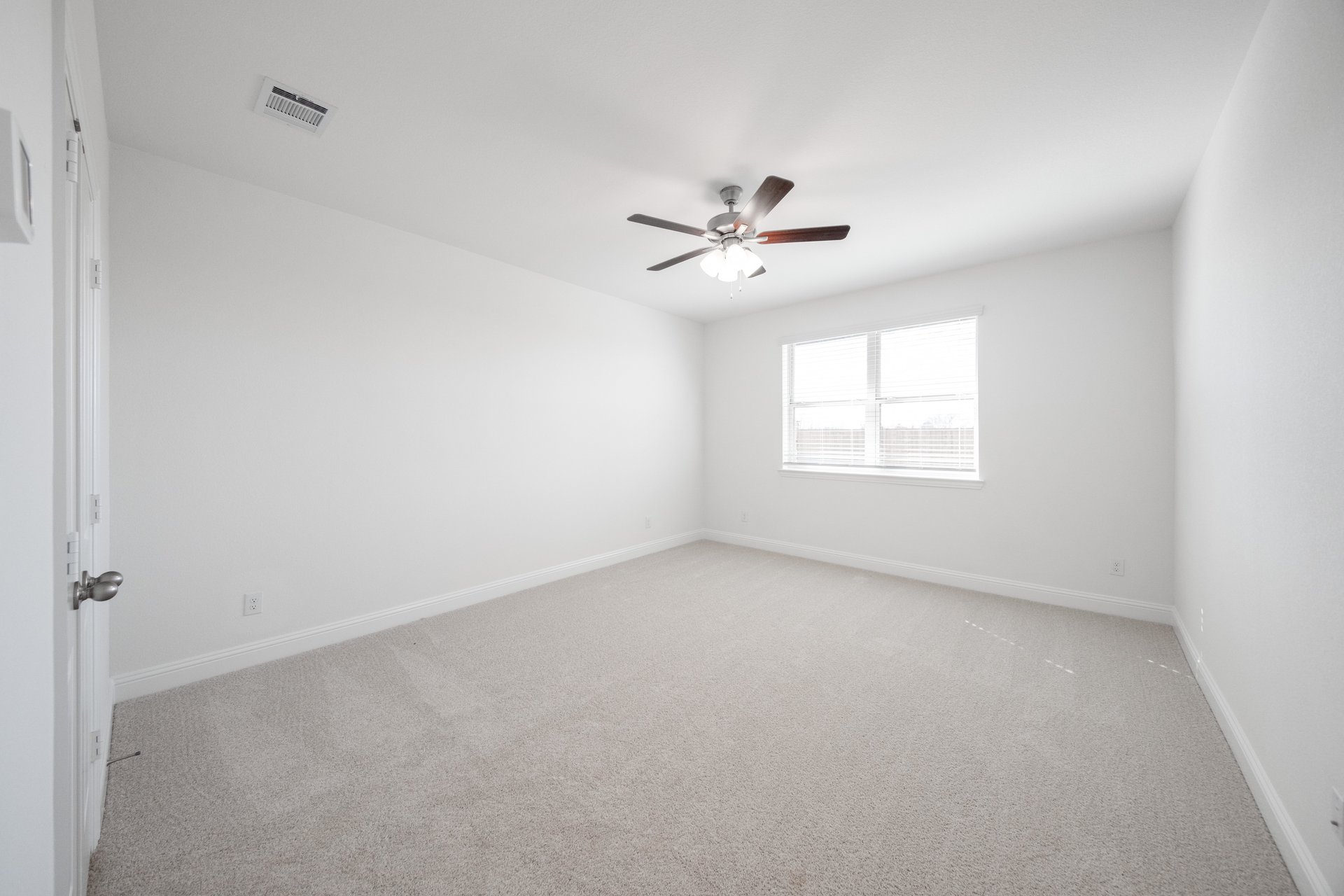 bedroom with carpet and ceiling fan 