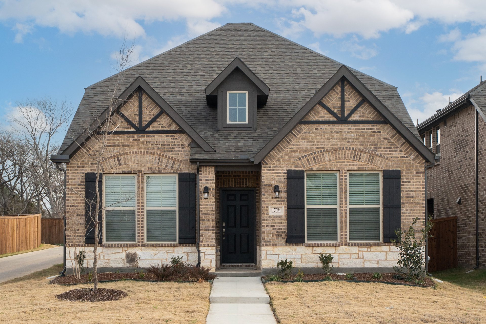 home exterior with brick and stone