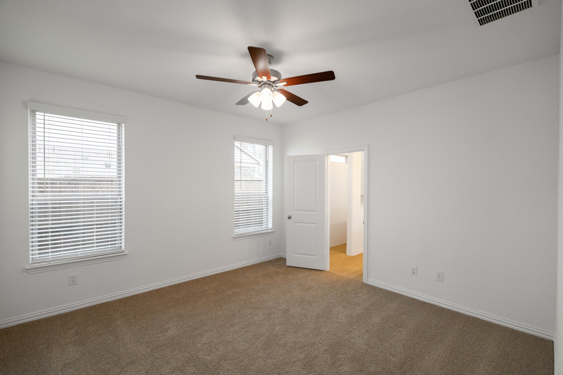 bedroom with carpet and ceiling fan