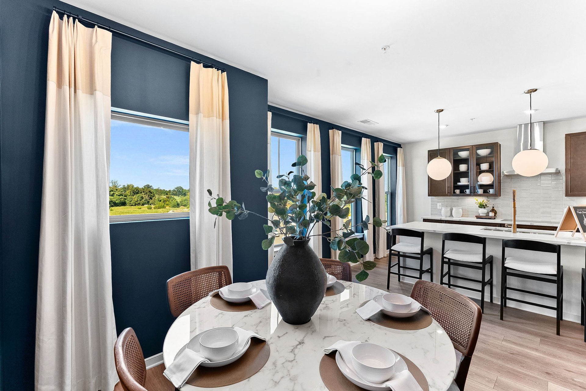 dining area with a round table and seating for four