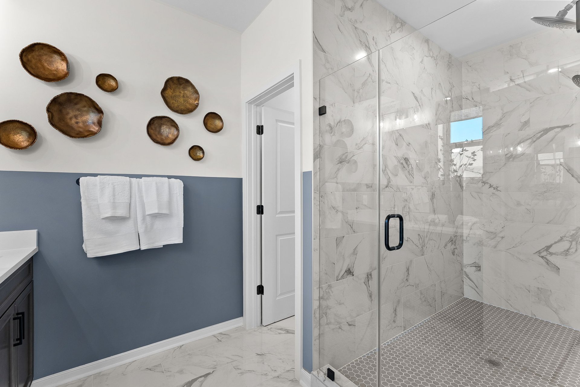 primary bathroom with an oversized shower
