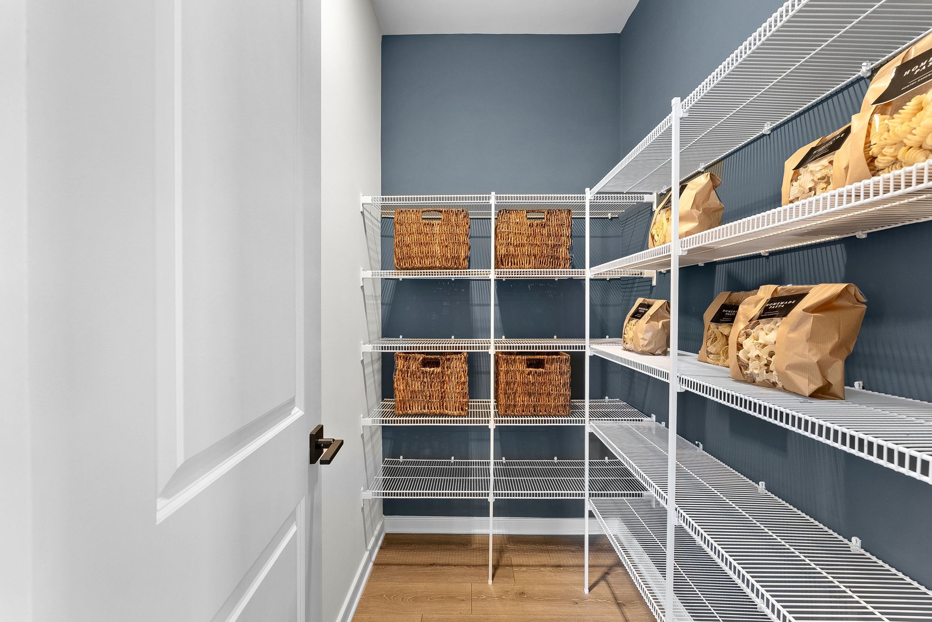 walk-in pantry with wire shelves