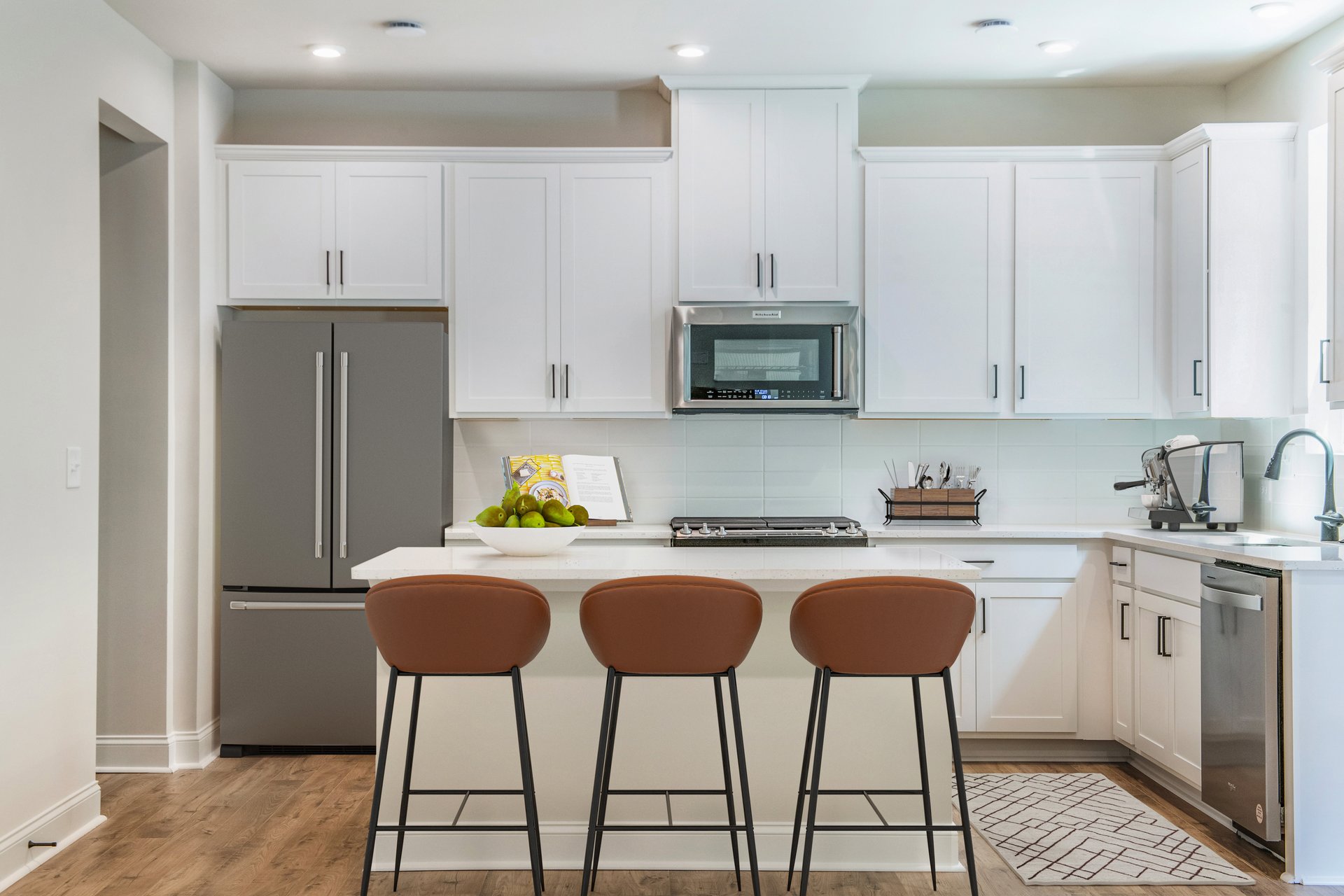 kitchen with center island and white cabinets 