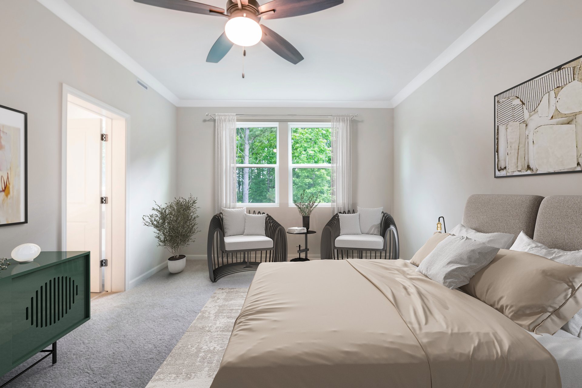 primary bedroom with kind bed and carpet