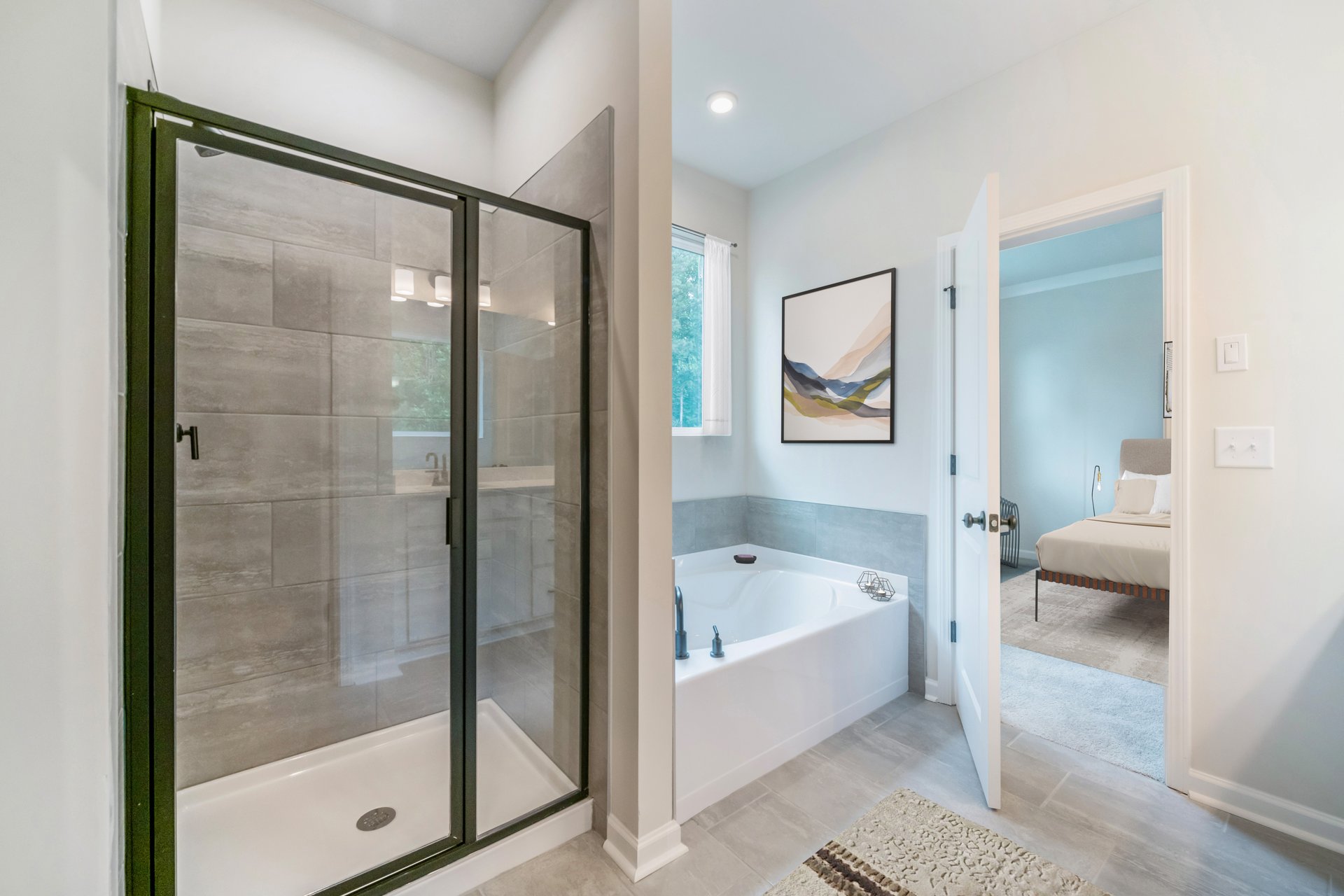 primary bathroom with separate rub and shower