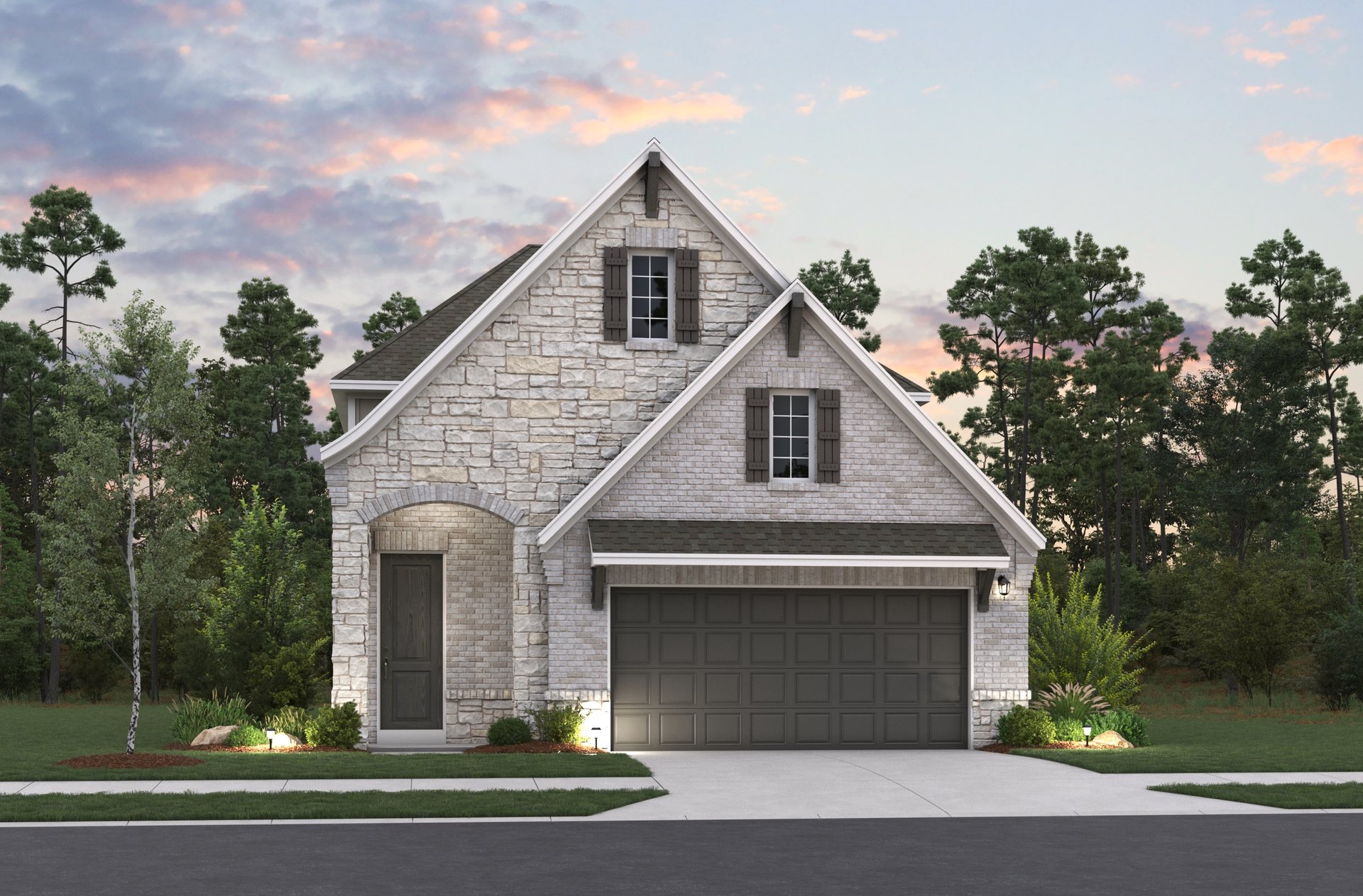 home with rock, windows, garage and landscaping