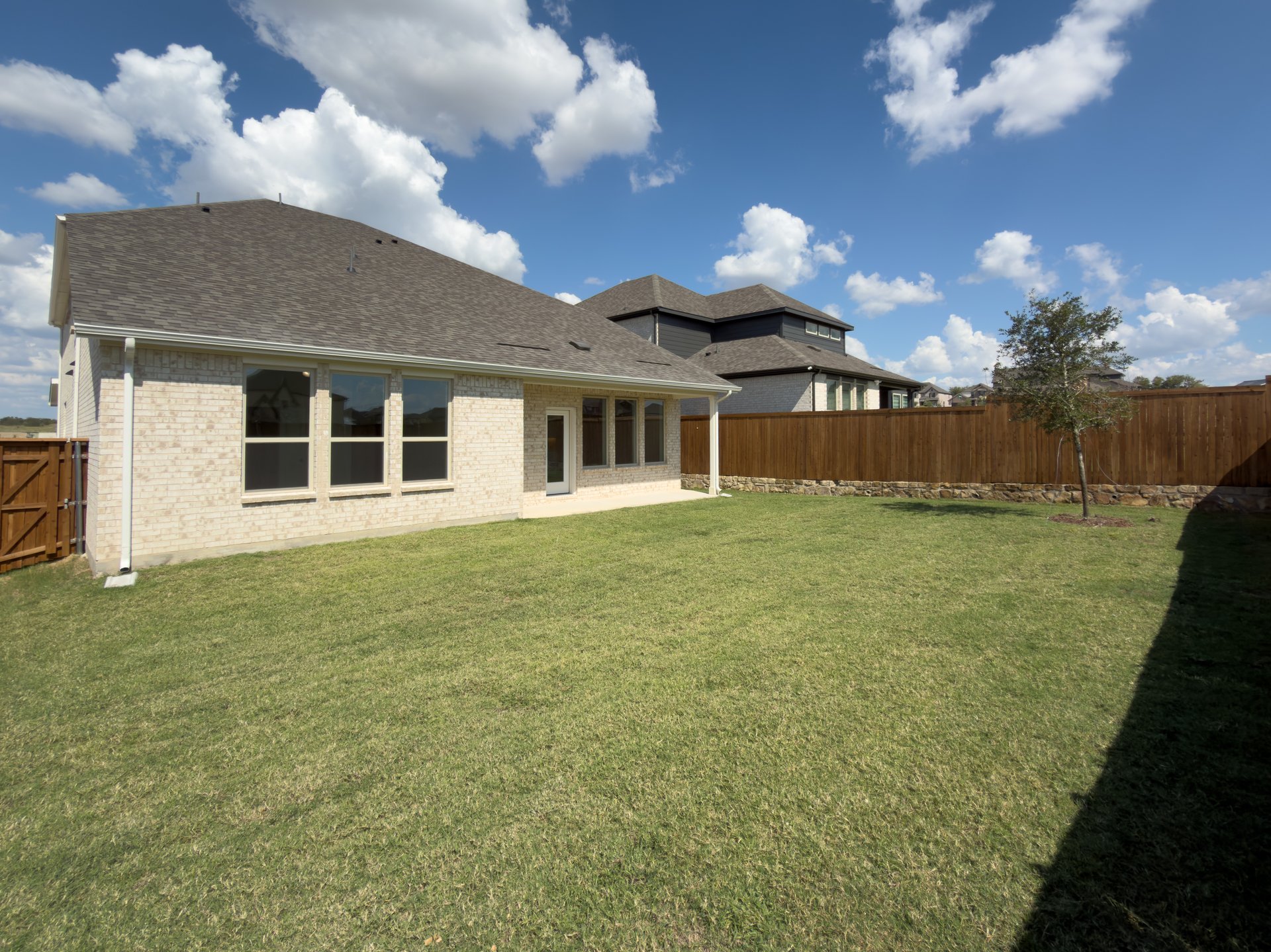 backyard of home with covered patio