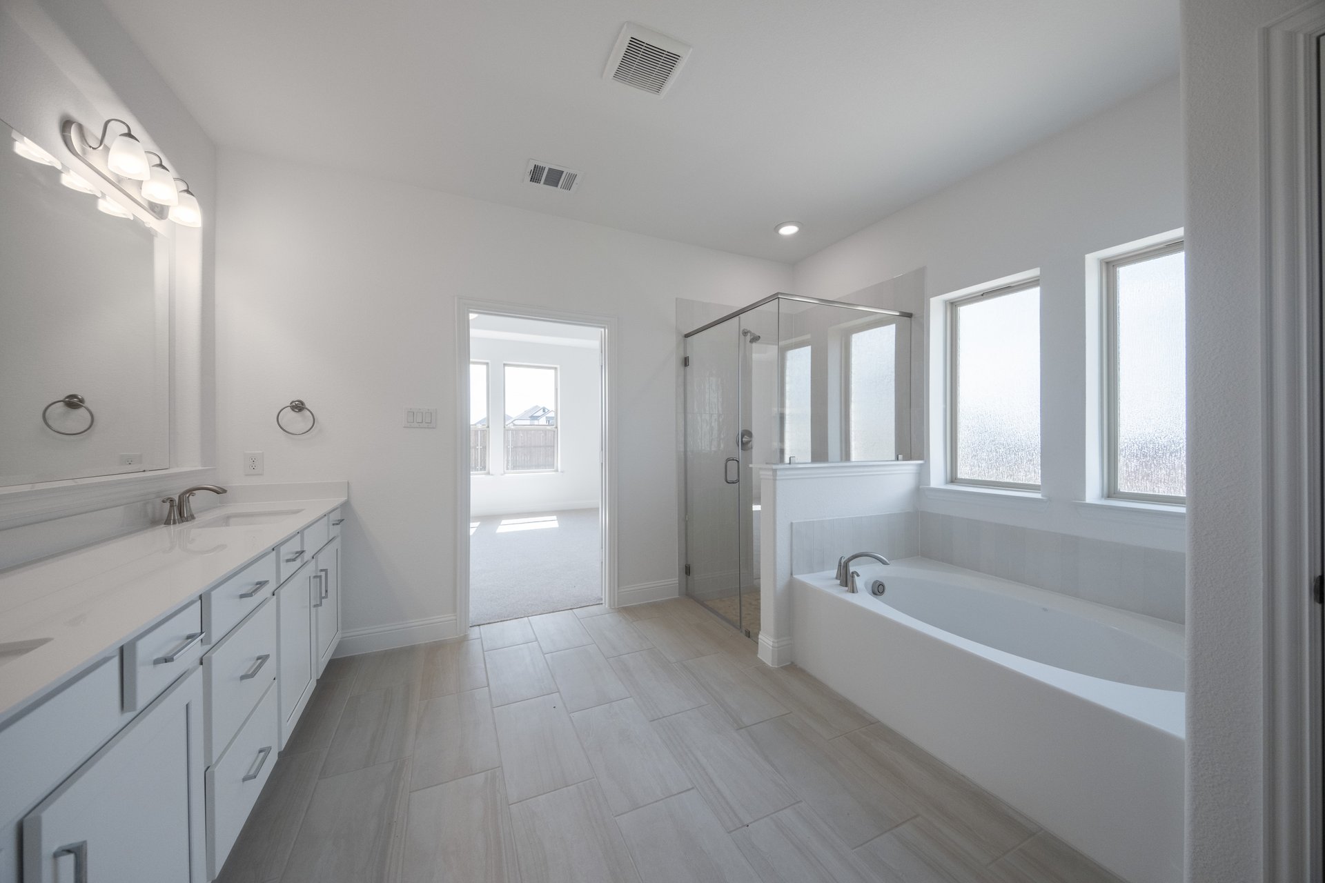 large primary bathroom with double sinks