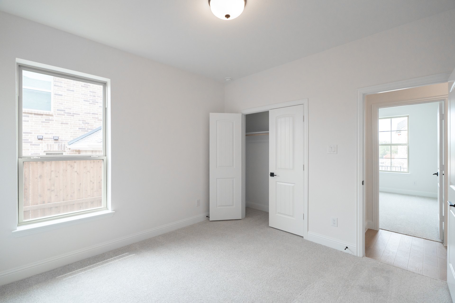 guest bedroom with carpet