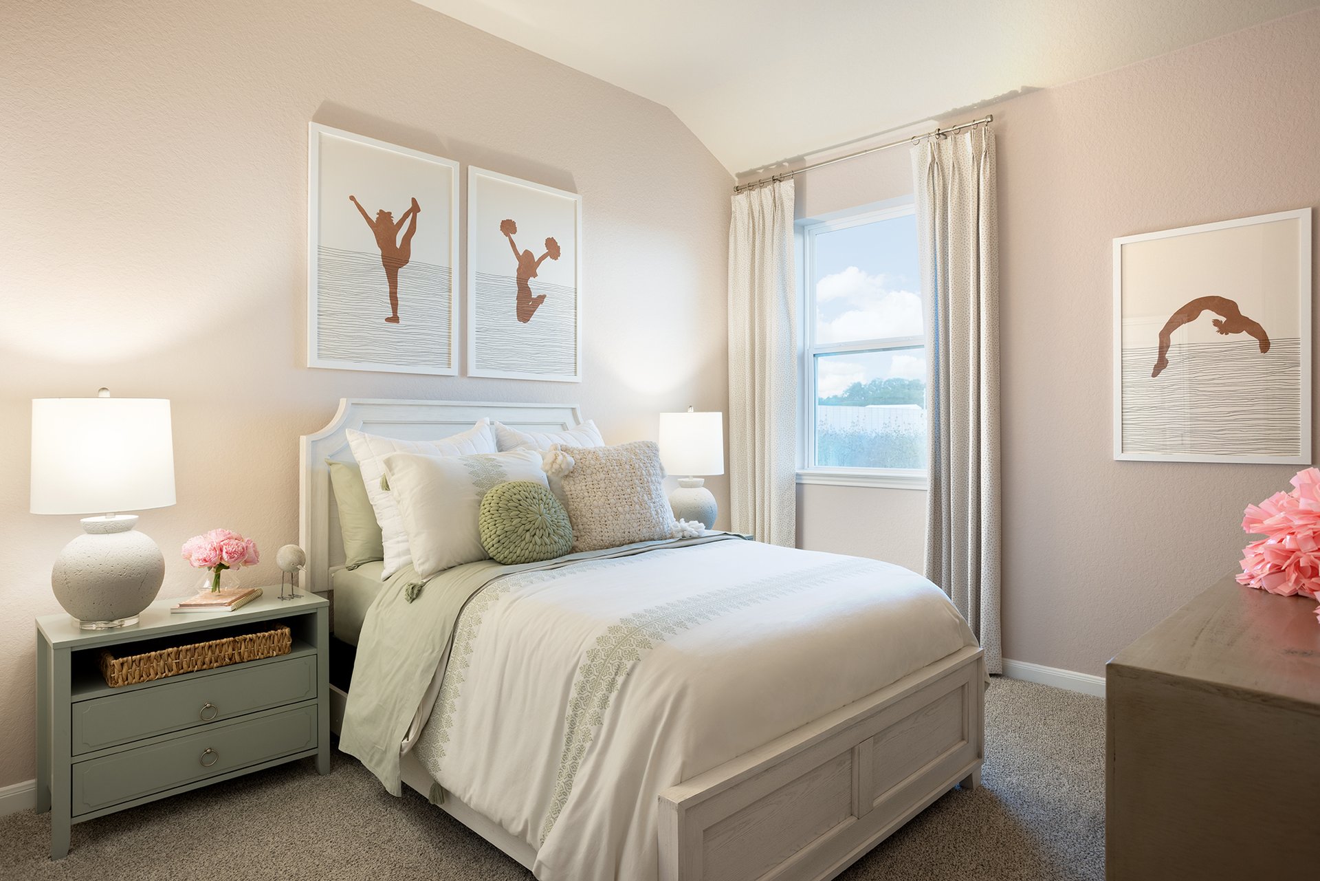 bedroom with carpet, windows & a sloped ceiling