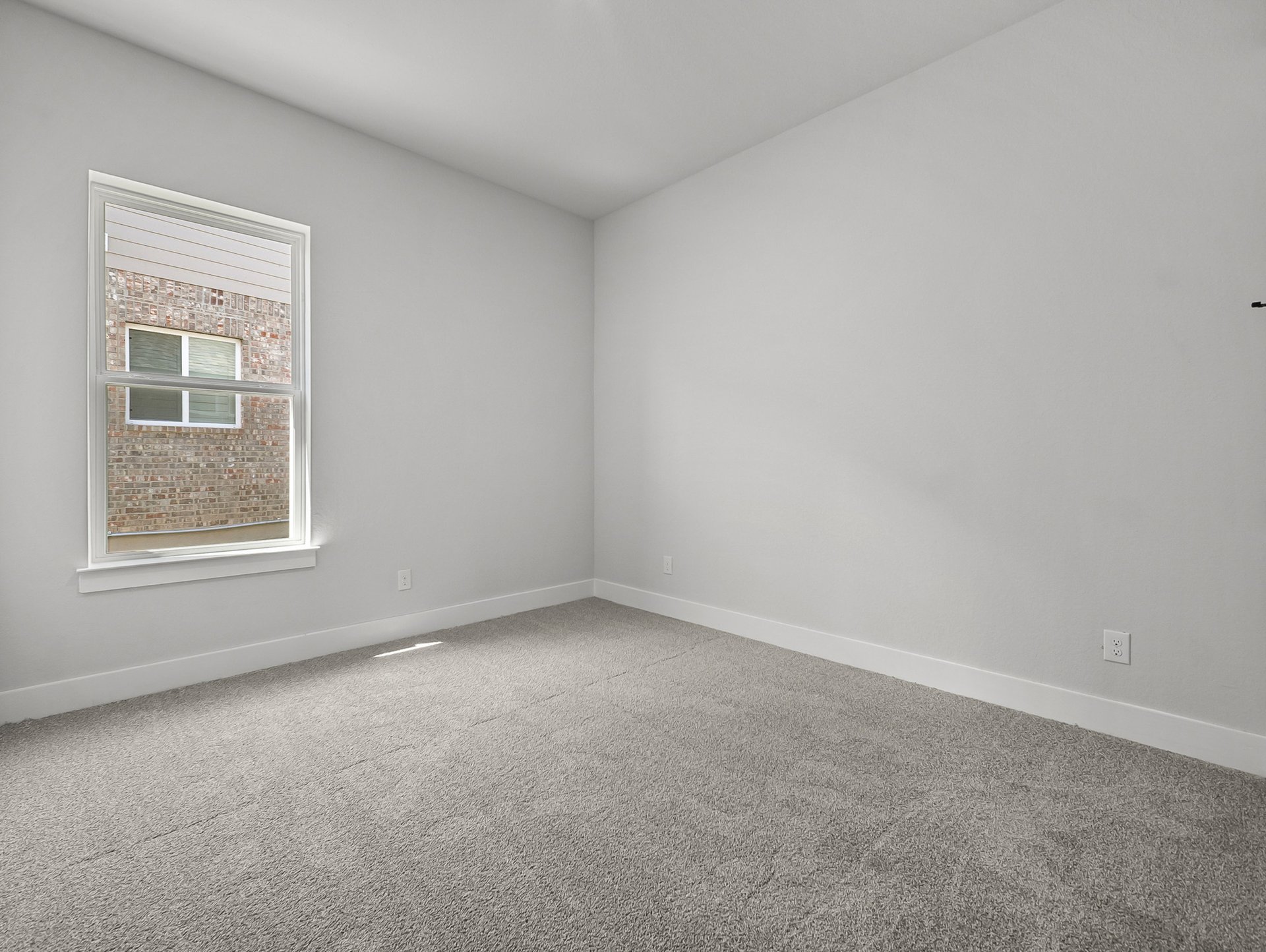 bedroom with carpet, windows & recessed lighting