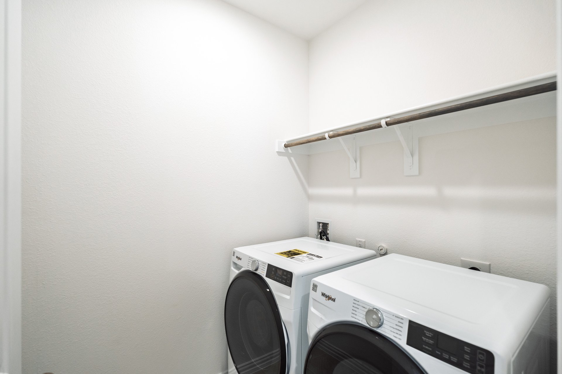 laundry with white shelves