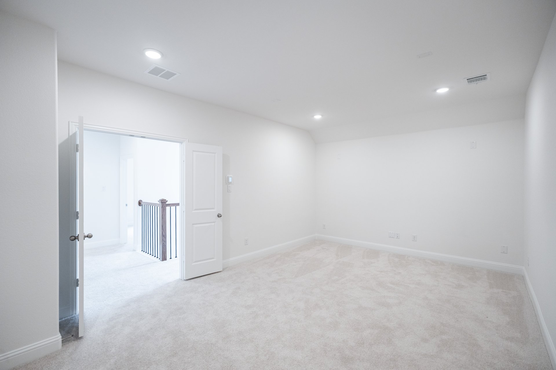 media room with french doors and carpet