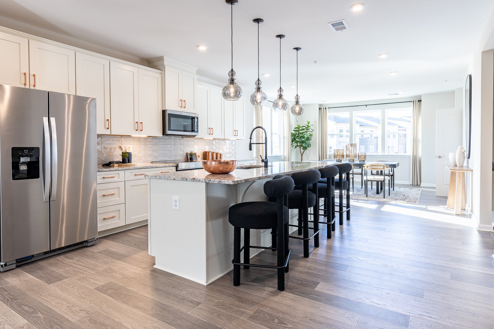 kitchen with white cabinets and granite countertops