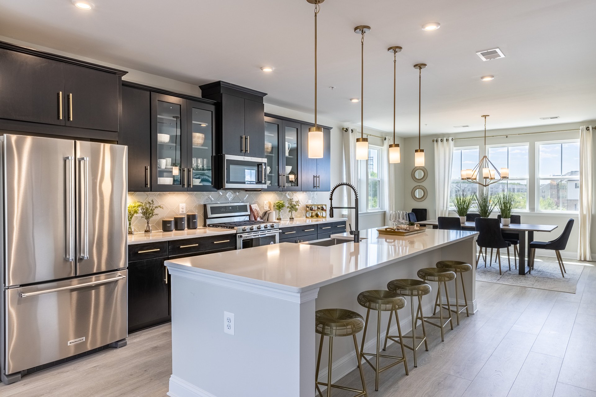 kitchen with a center island and barstools