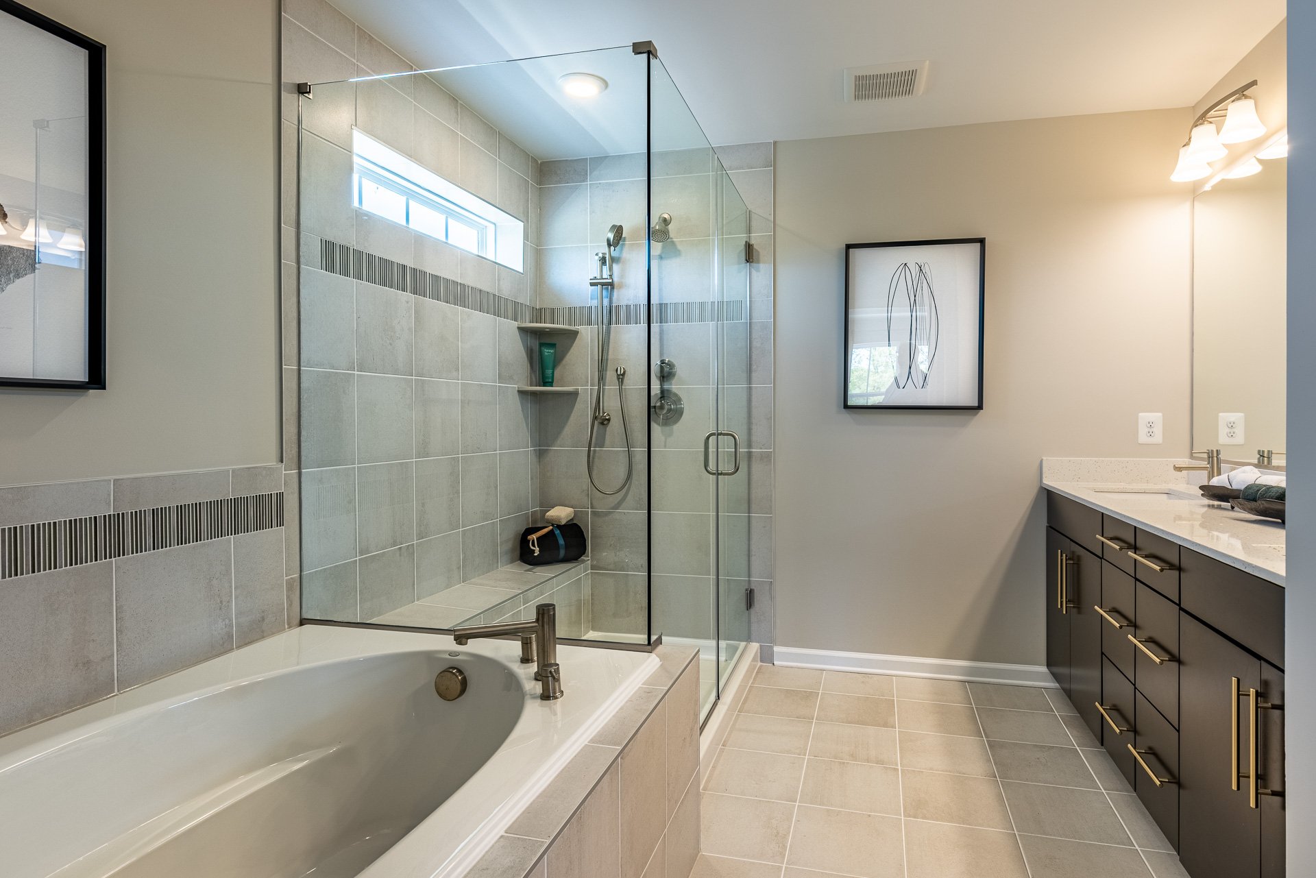 primary bath with a separate shower and soaking tub