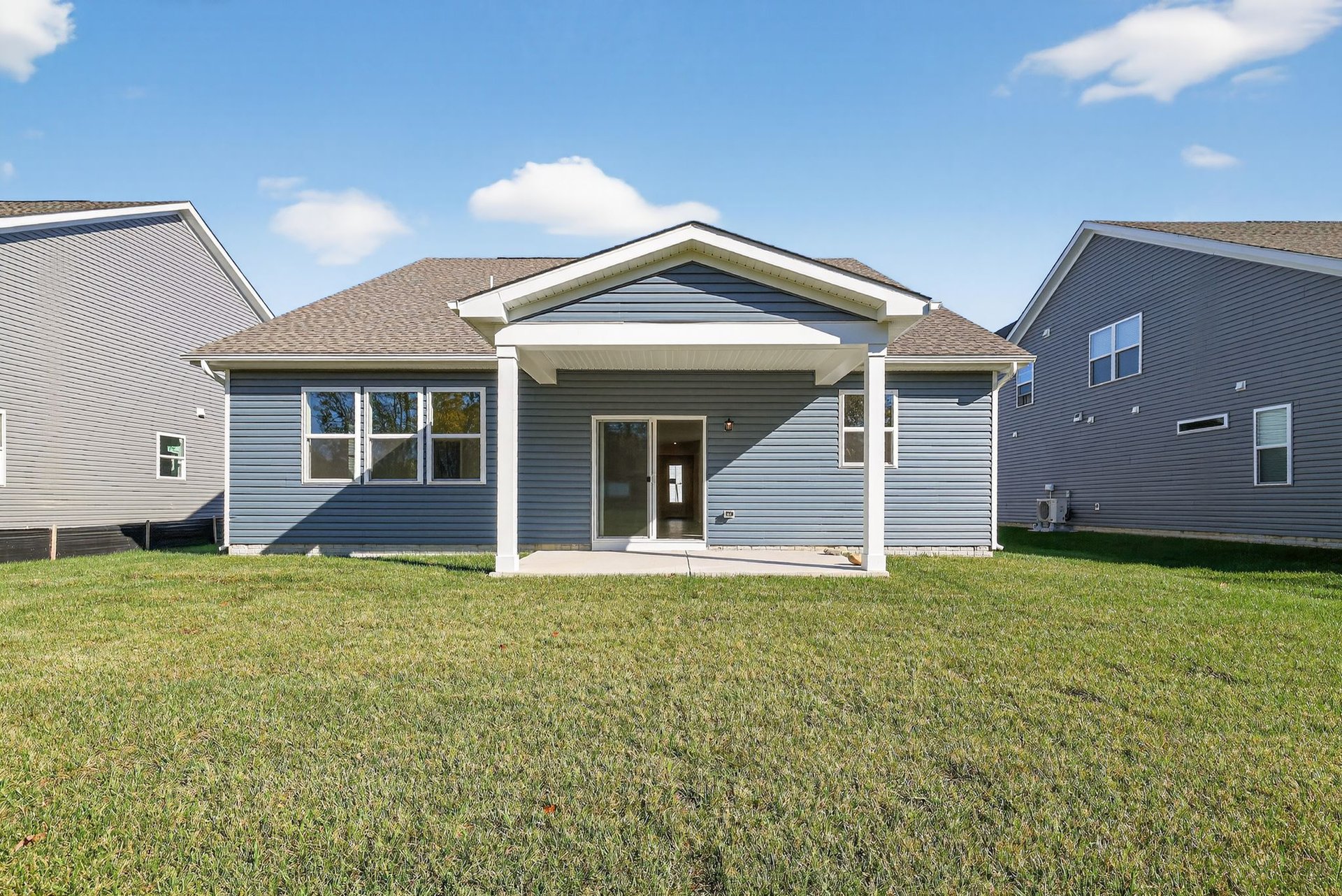 rear exterior with a covered patio