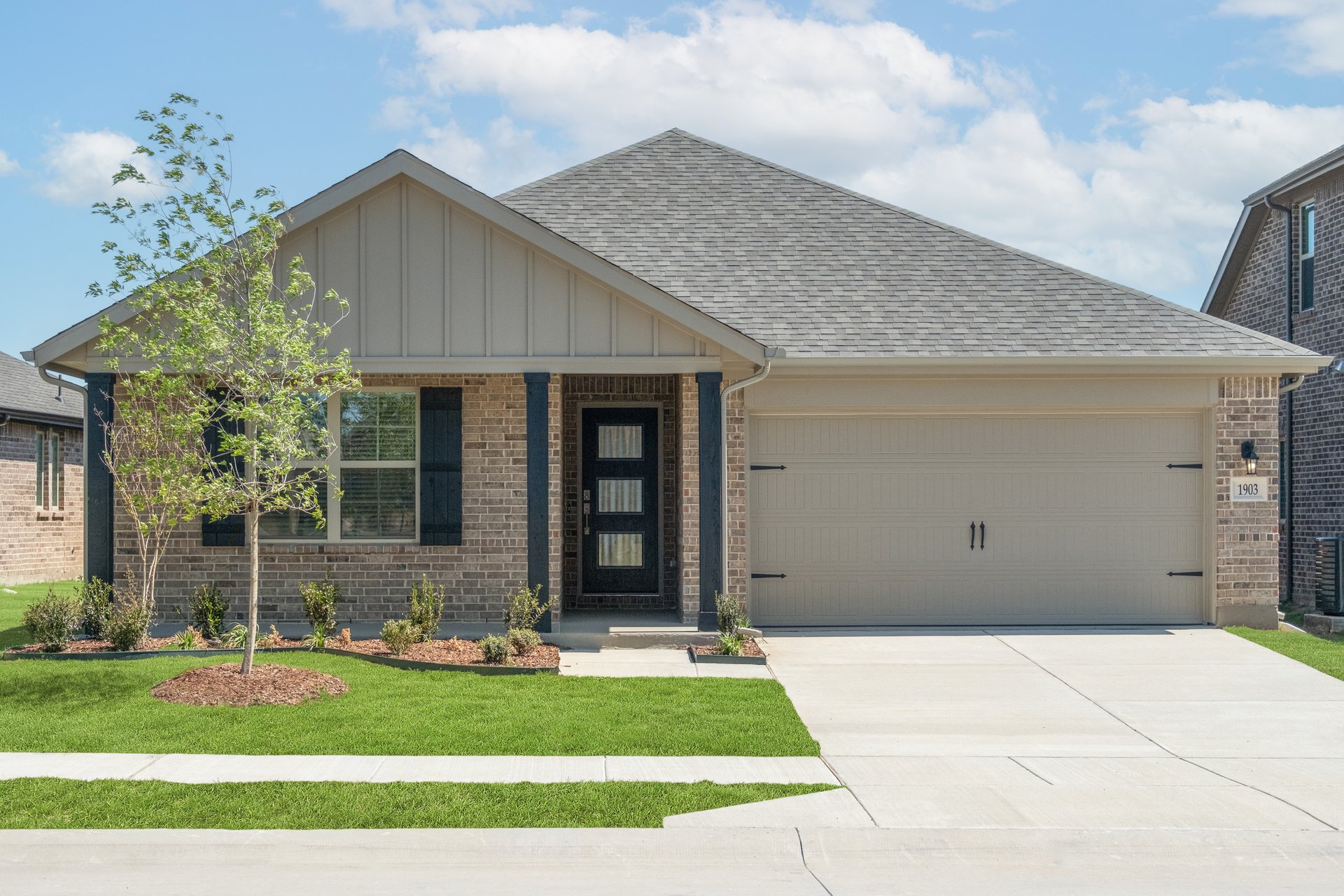 one-story with brick and stone exterior