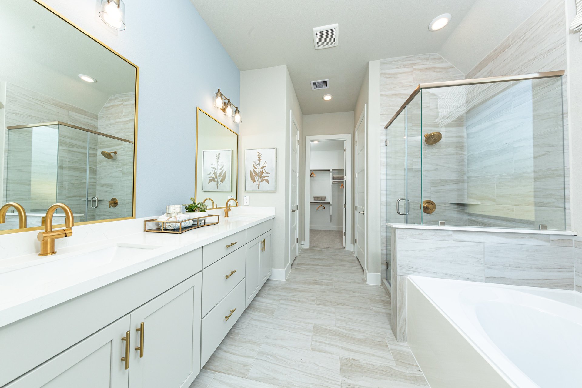 primary bathroom with soaking tub and shower