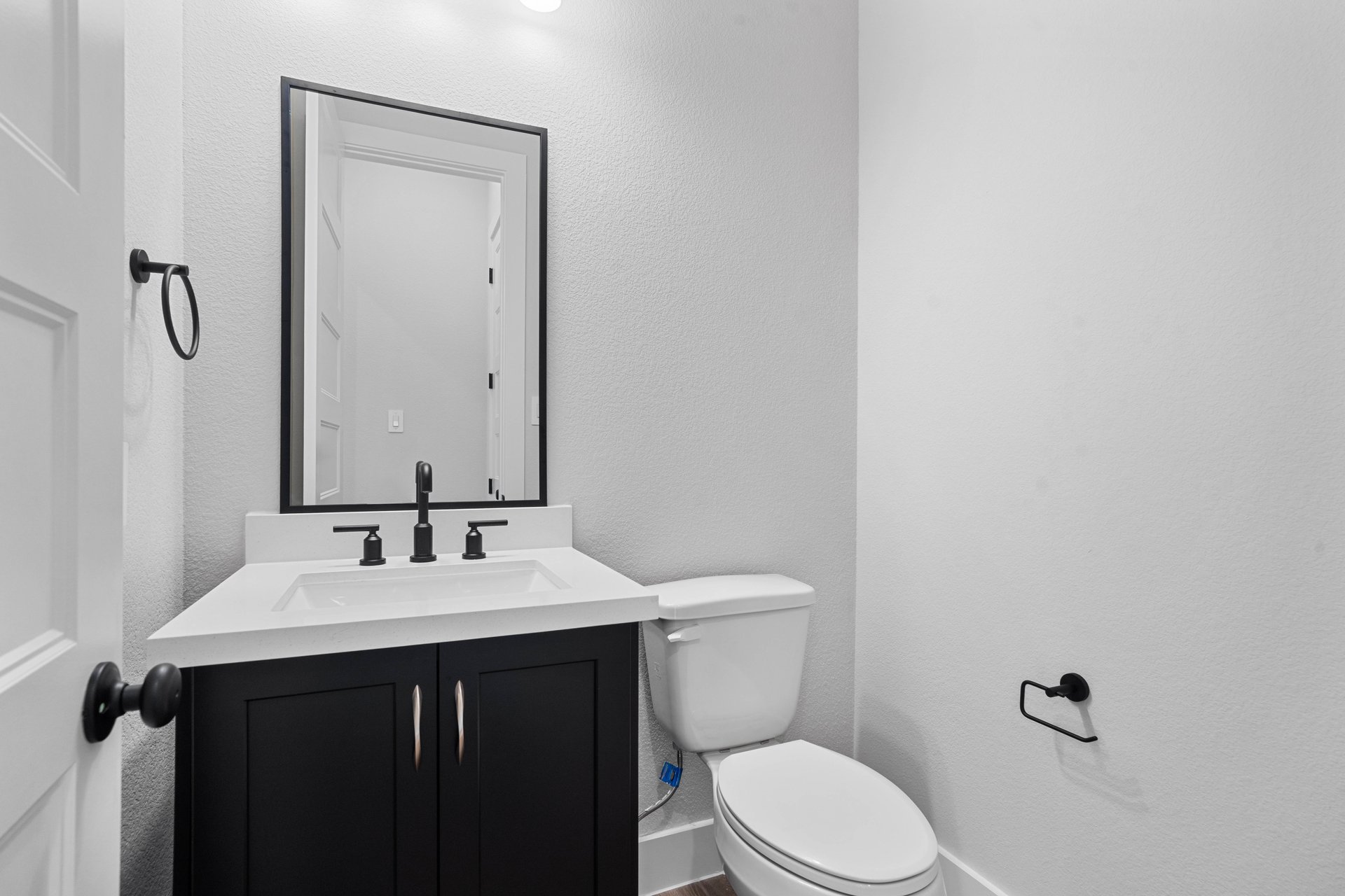 powder bathroom with vanity sink