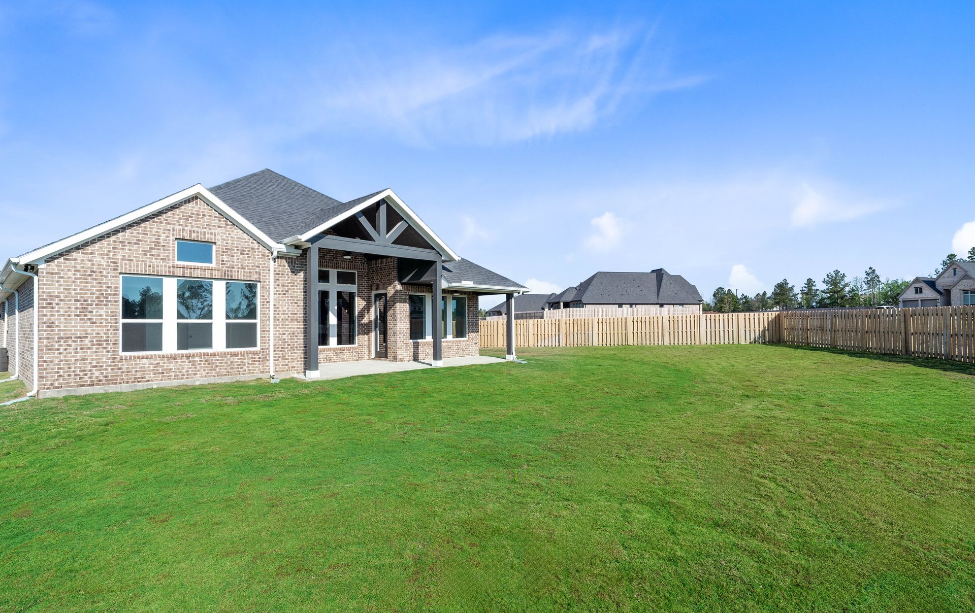 backyard of home with covered patio