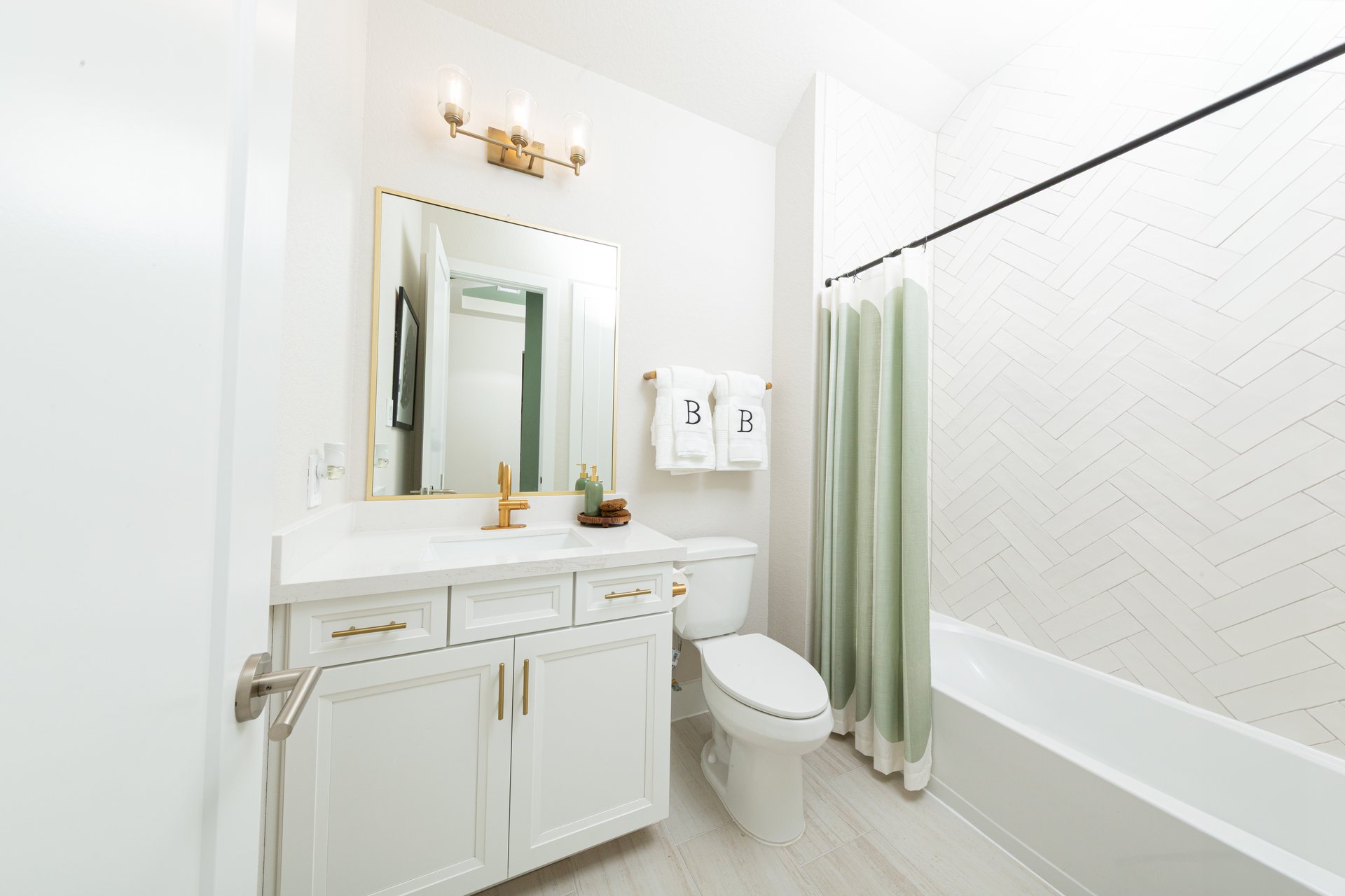 NEW Reflection secondary bathroom.jpg