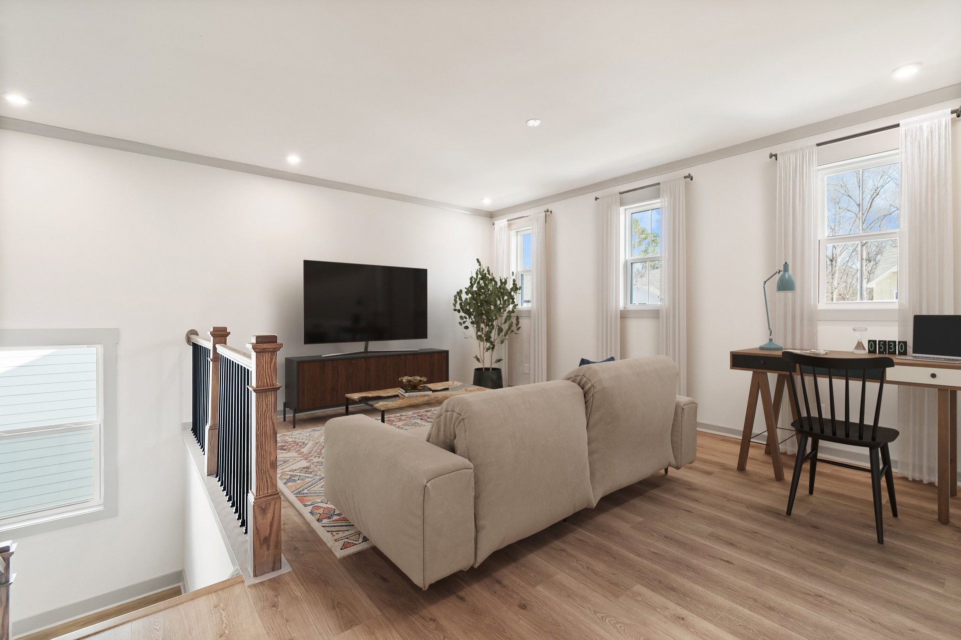 loft with hard-surface flooring and media room setup