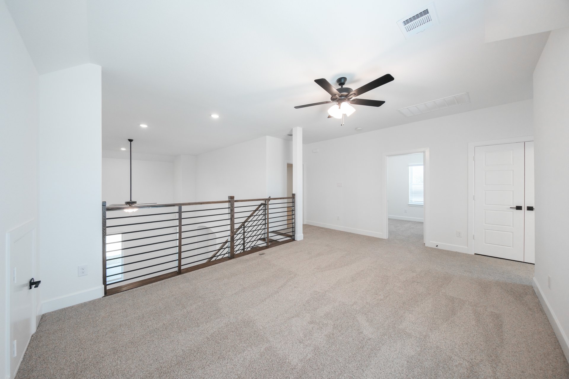 open game room with carpet