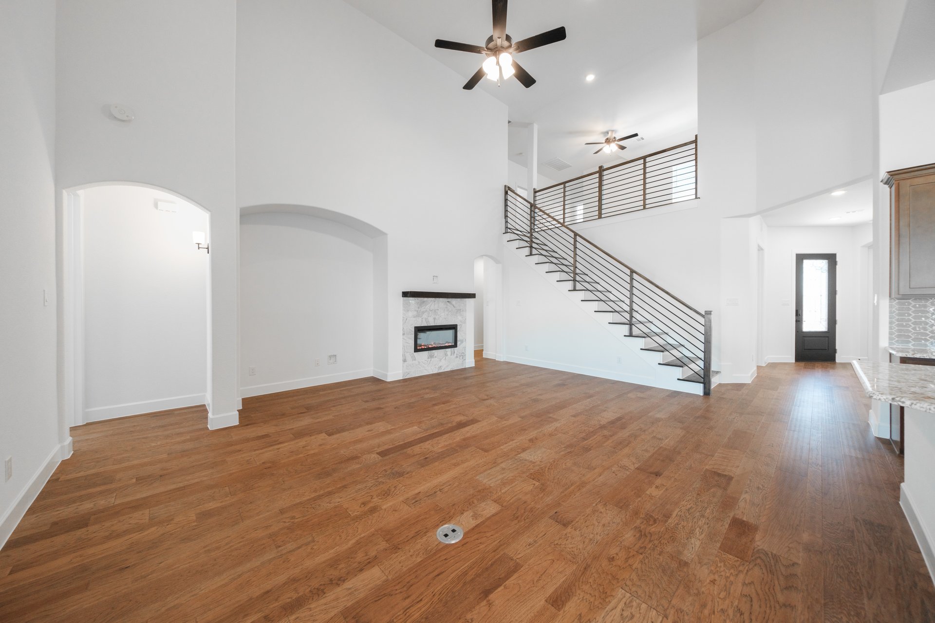 open great room with two-story ceilings