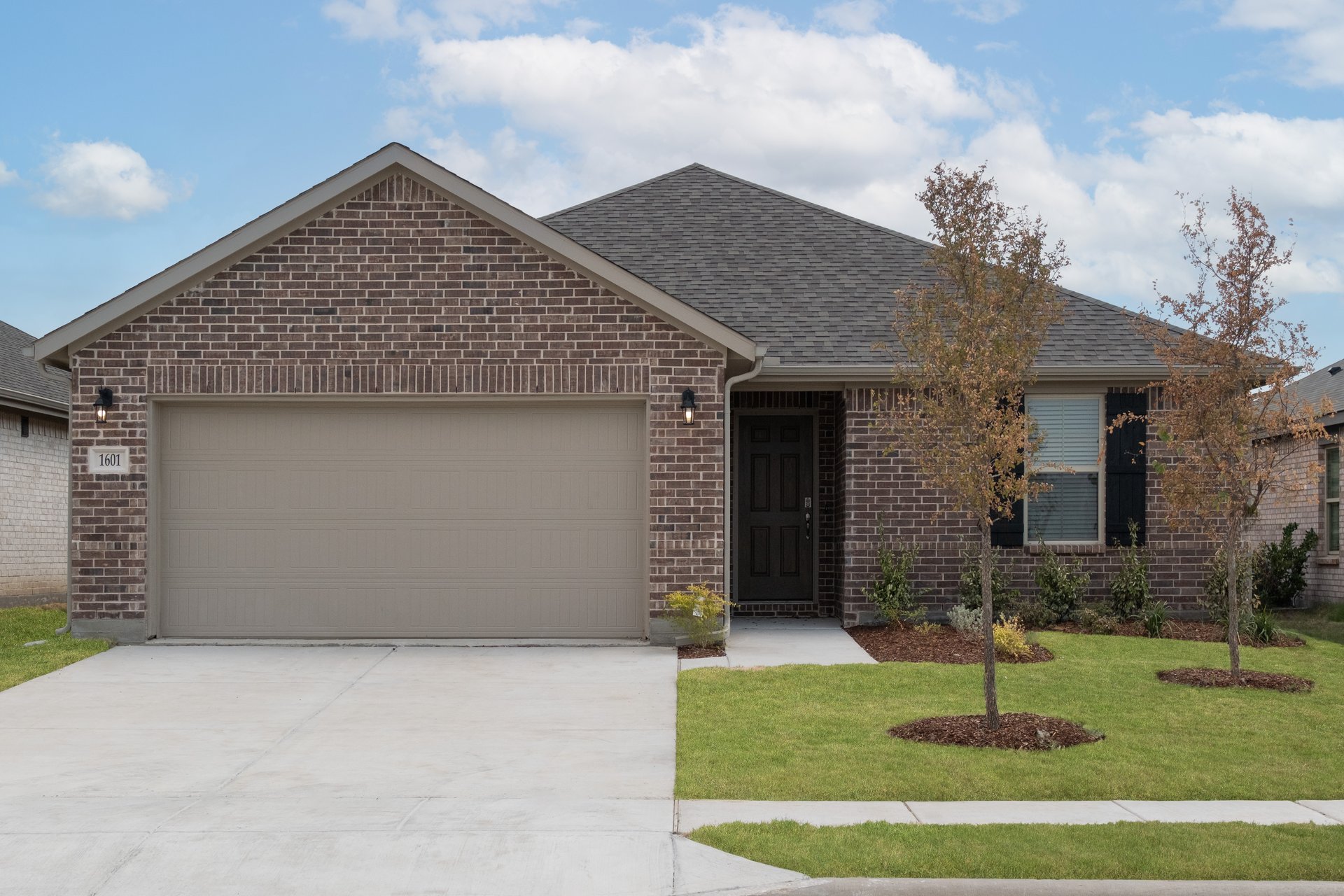 one-story home with brick exterior with shutters 