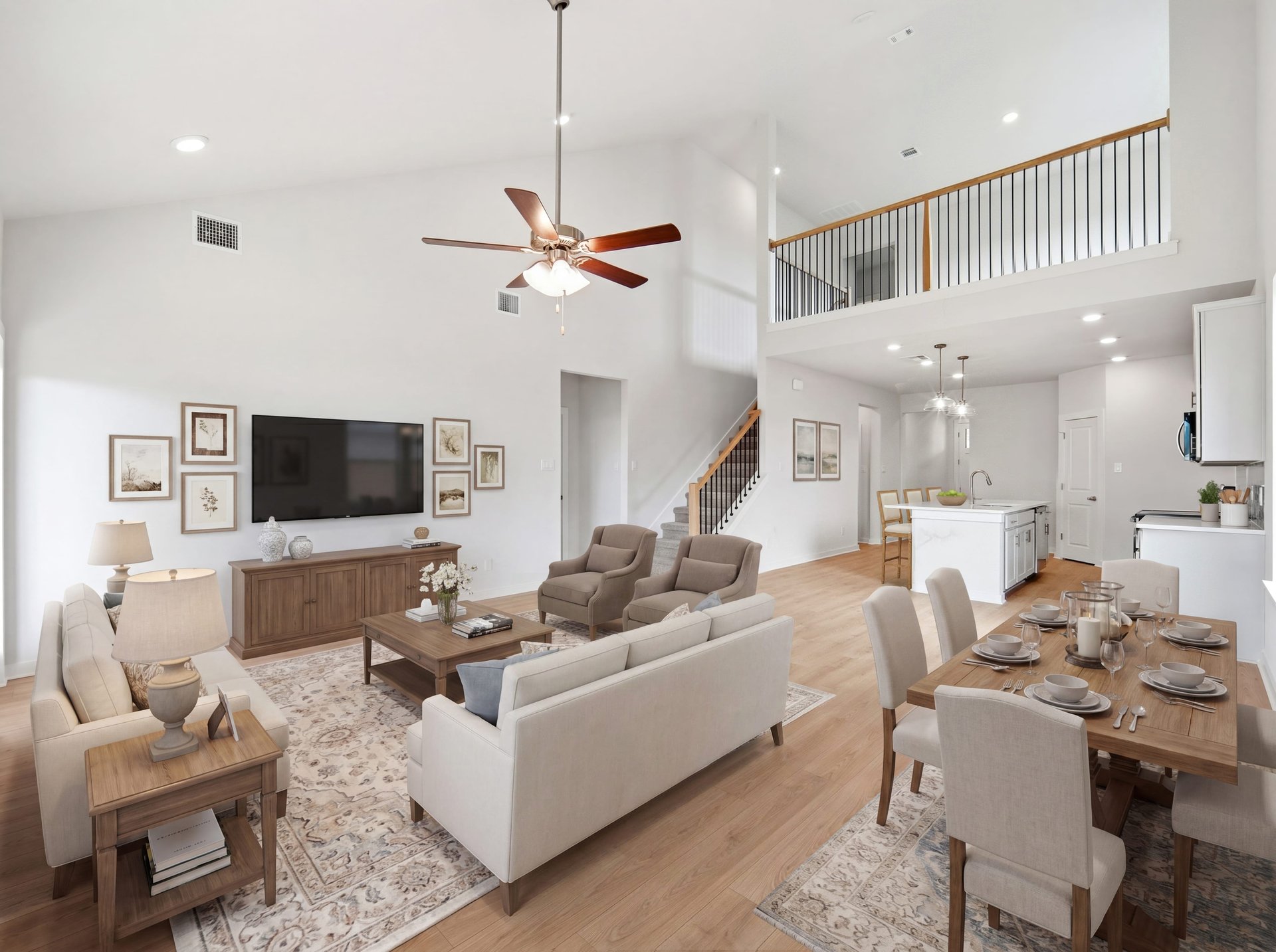 great room with brown floor, dining area and stairs