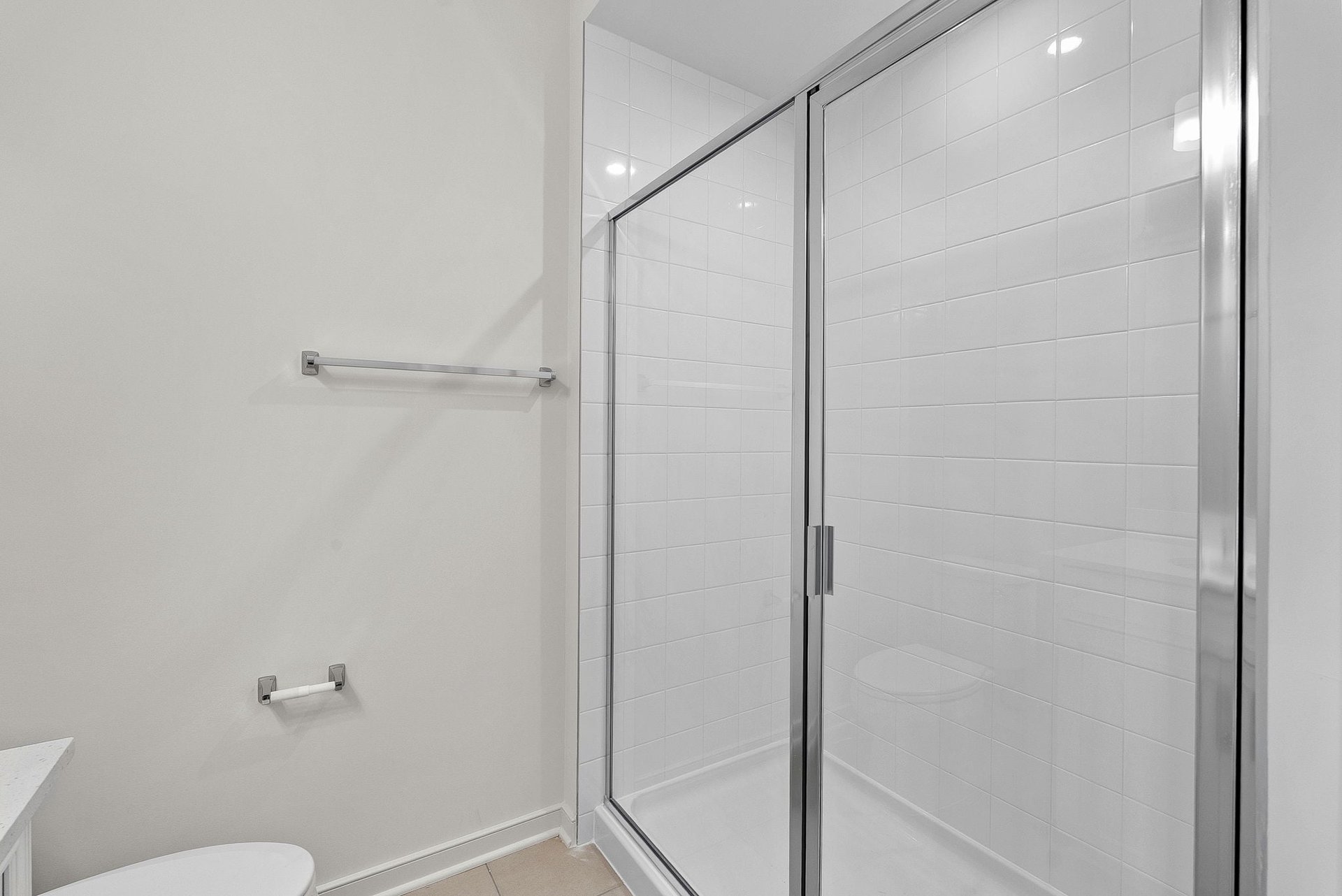 secondary bath with an oversized shower