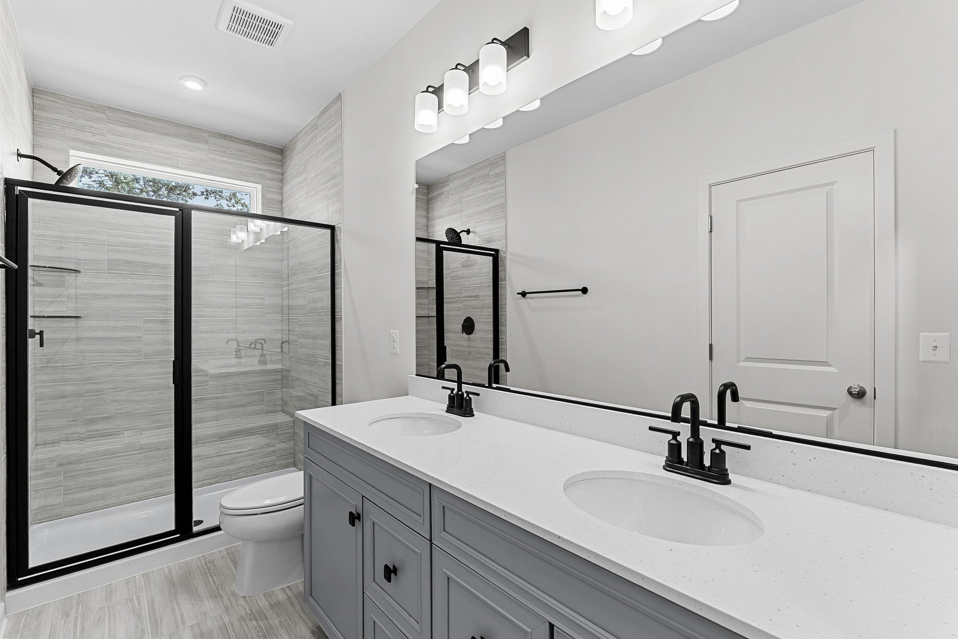 primary bathroom with an oversized shower